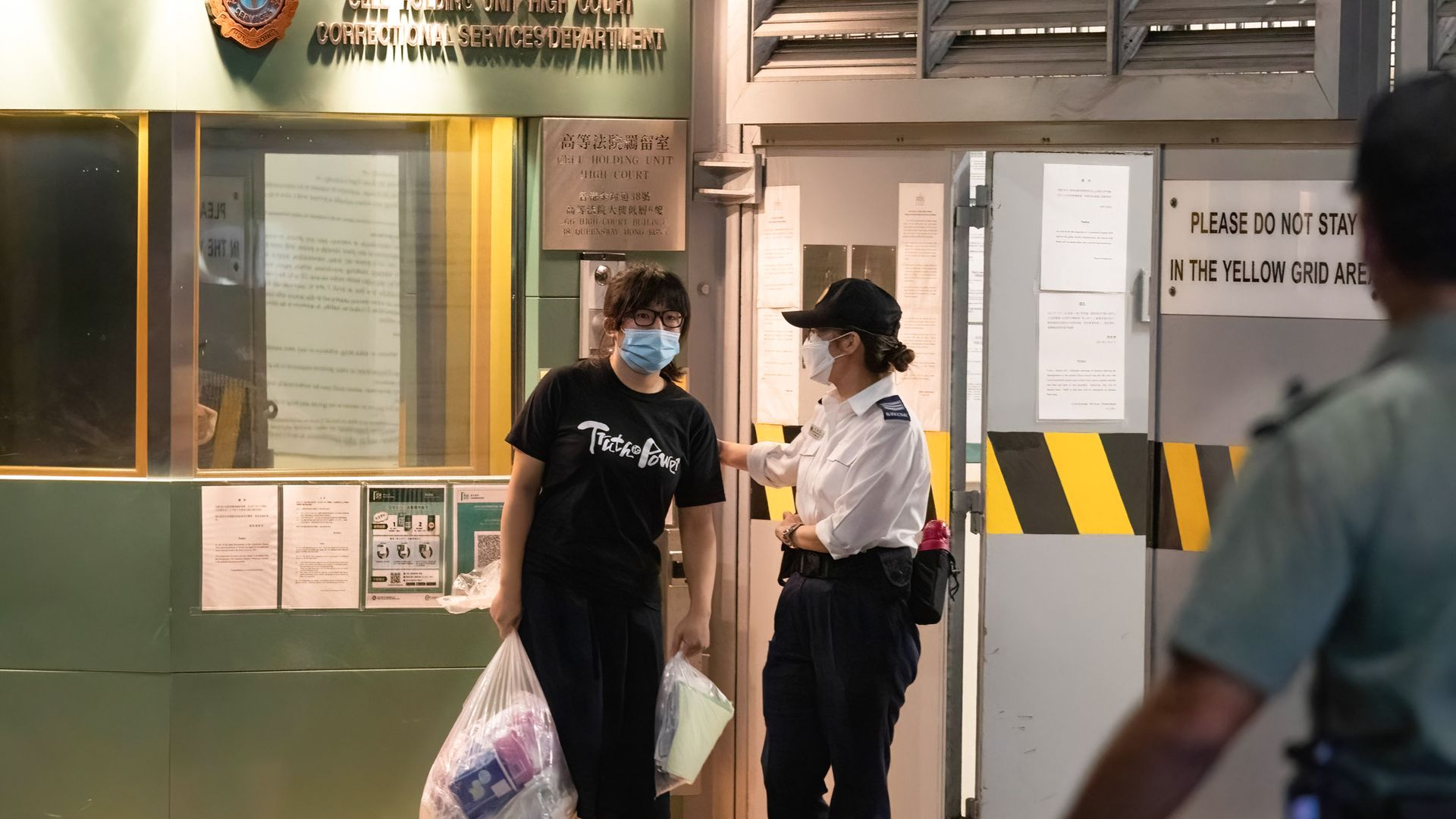 Barrister Chow Hang-Tung, the vice-chairwoman of annual June 4th Tiananmen Square vigil organization leaves a Hong Kong court in August