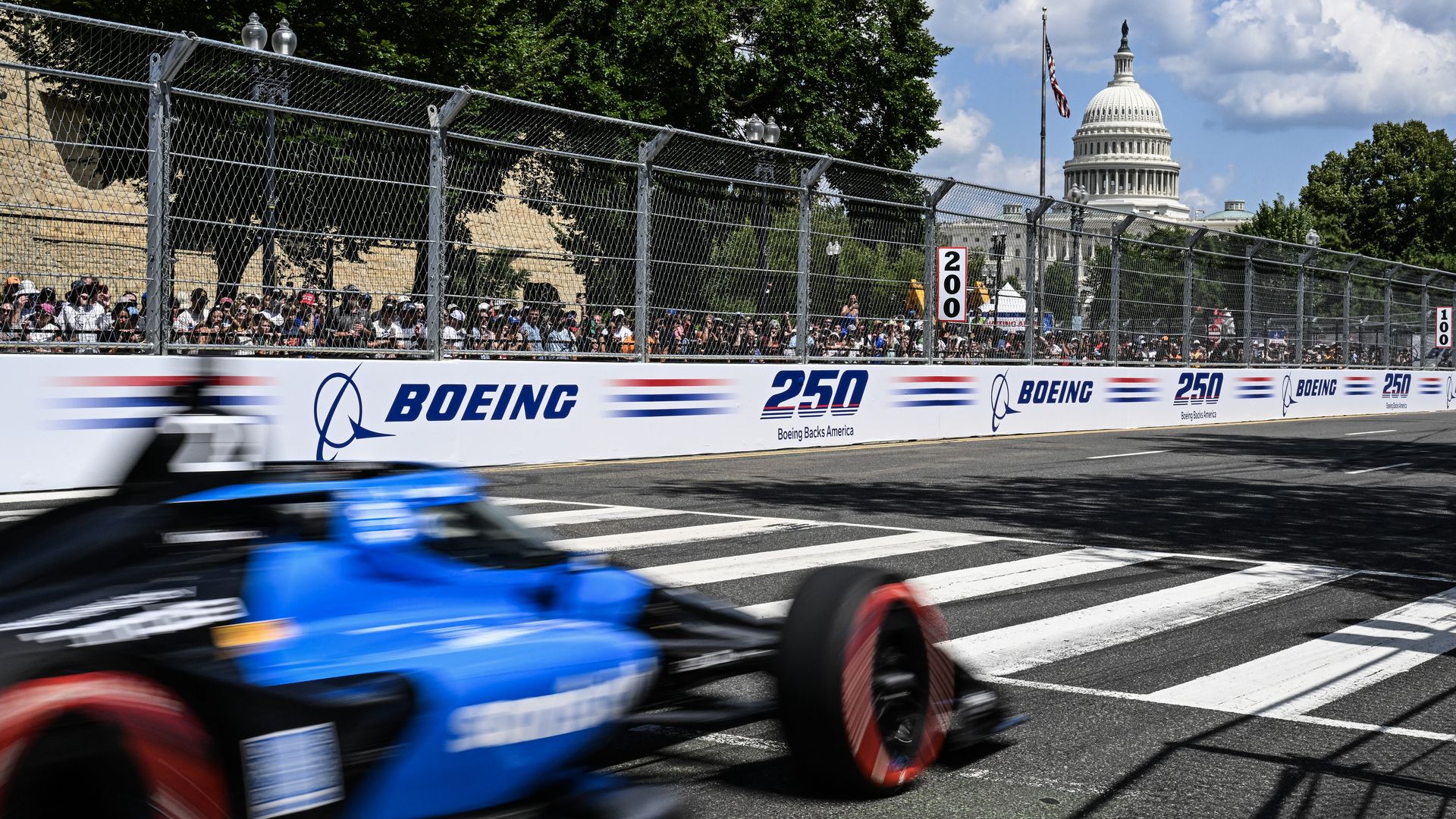 An IndyCar races in front of the U.S. Capitol during the IndyCar Freedom 250 Grand Prix in Washington, DC.