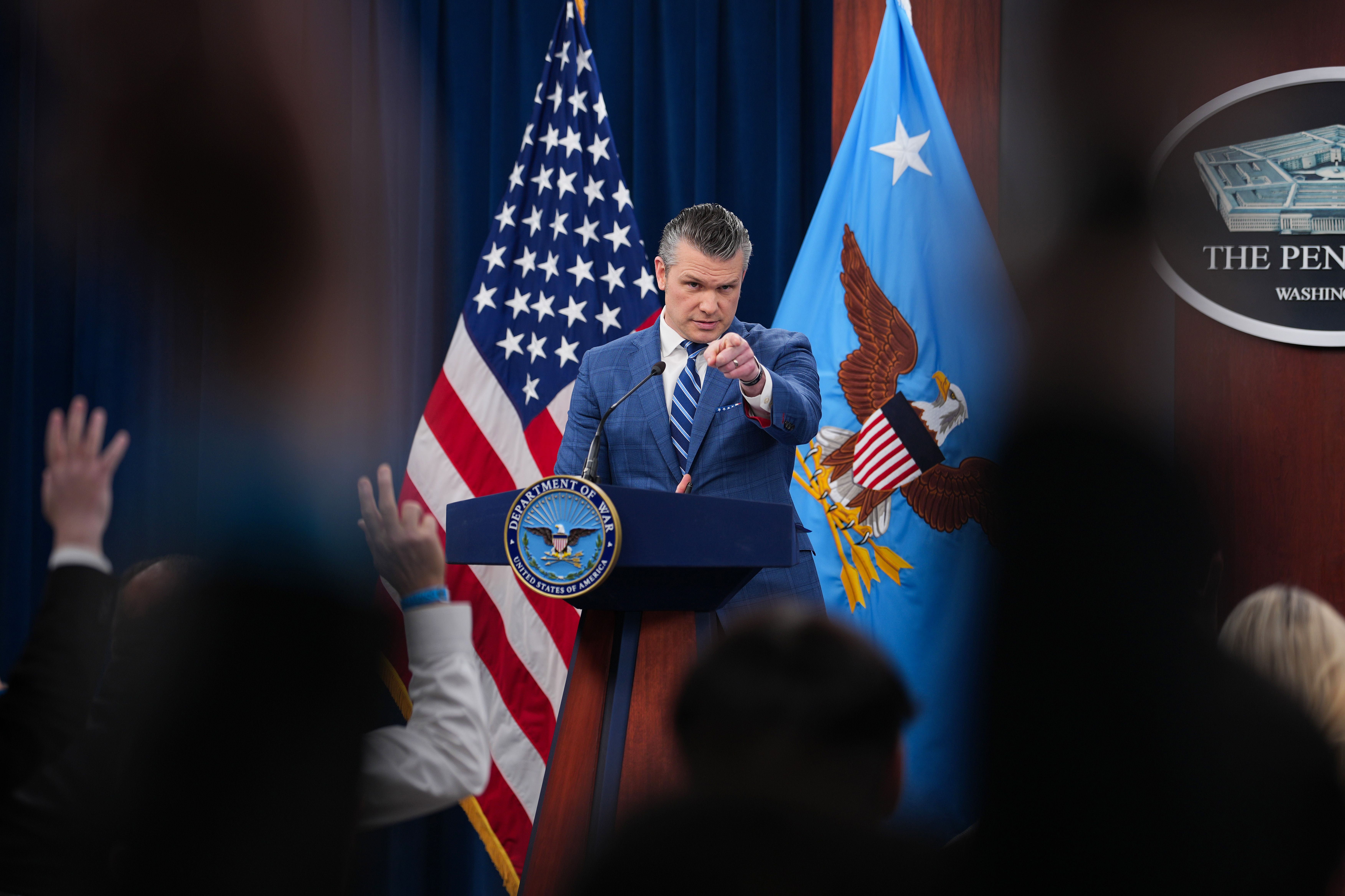 ARLINGTON, VIRGINIA - APRIL 08: U.S. Secretary of War Pete Hegseth takes questions during a press briefing at the Pentagon on April 08, 2026 in Arlington, Virginia. It was announced that a temporary ceasefire has been reached between the U.S., Iran, and Israel, pausing attacks for about two weeks wh