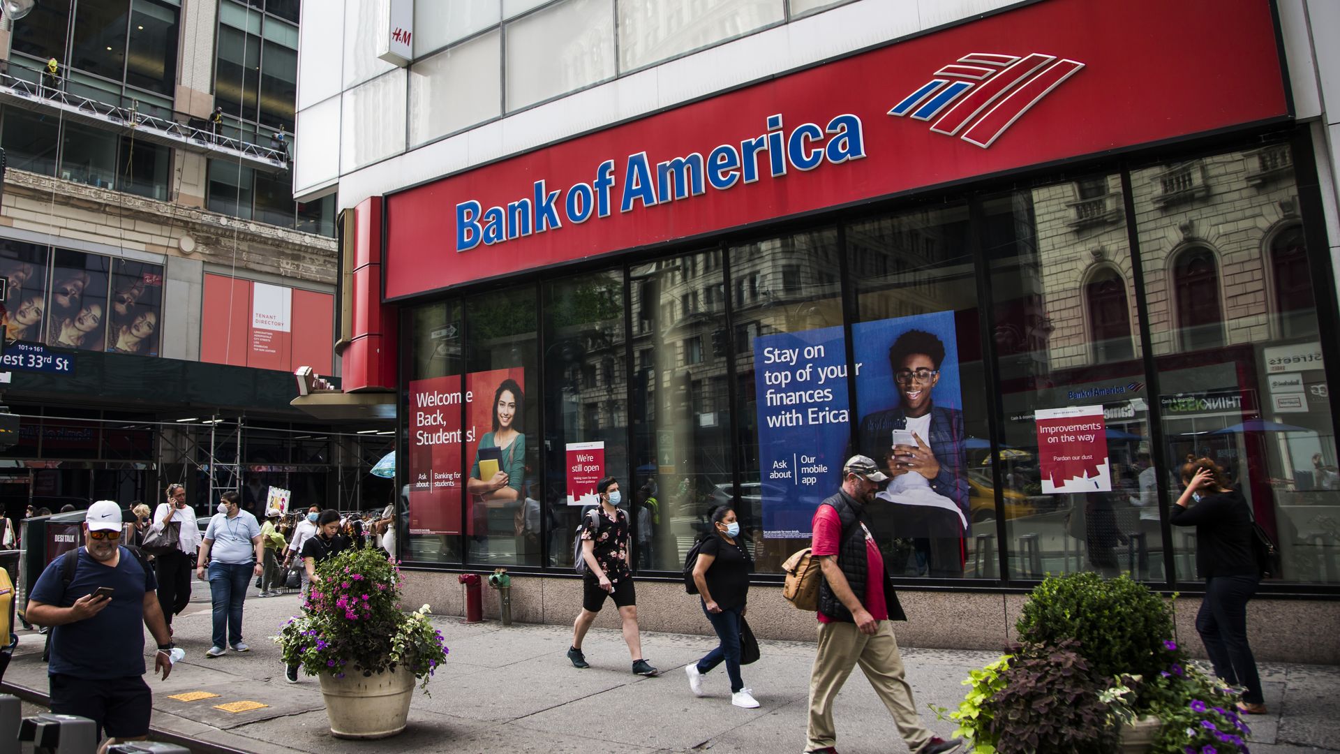People walking past a Bank of America branch in New York City in August 2021.