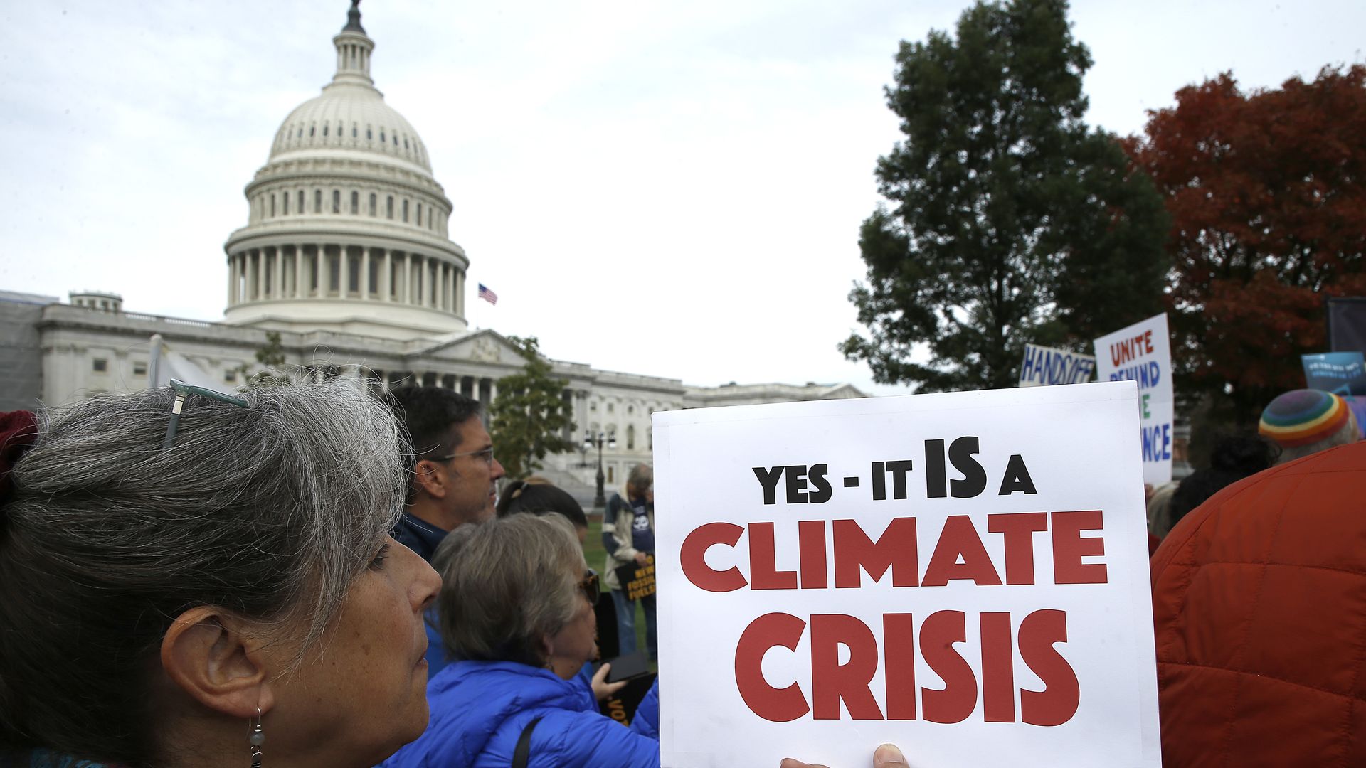 Climate protestors outside Congress