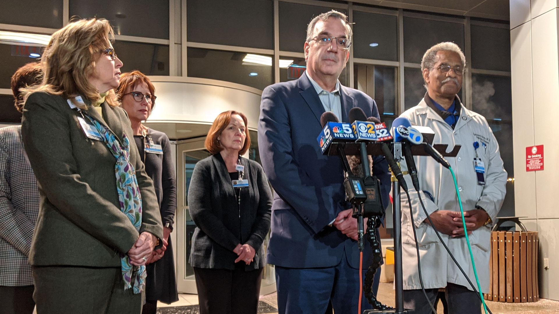 Officials holding a press conference.