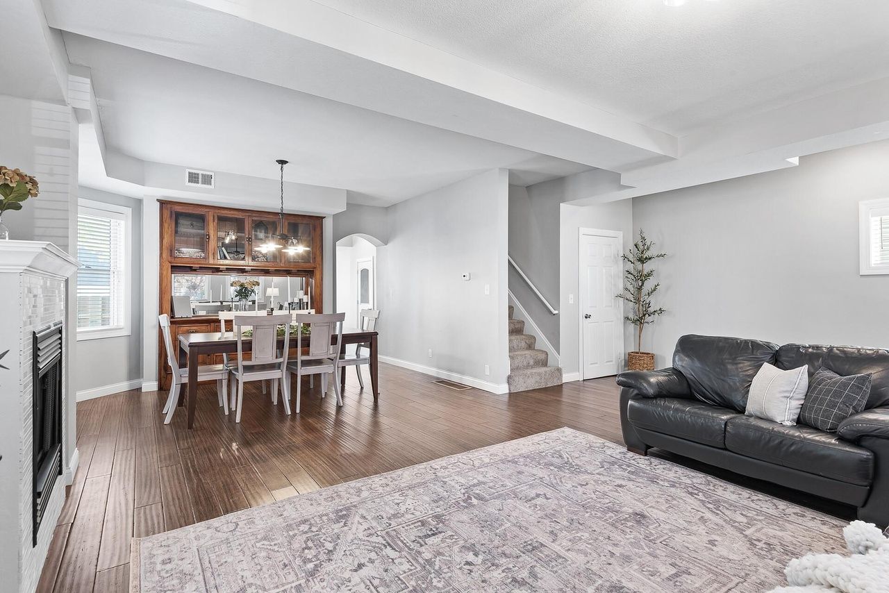 living room that opens to dining room with built in buffet