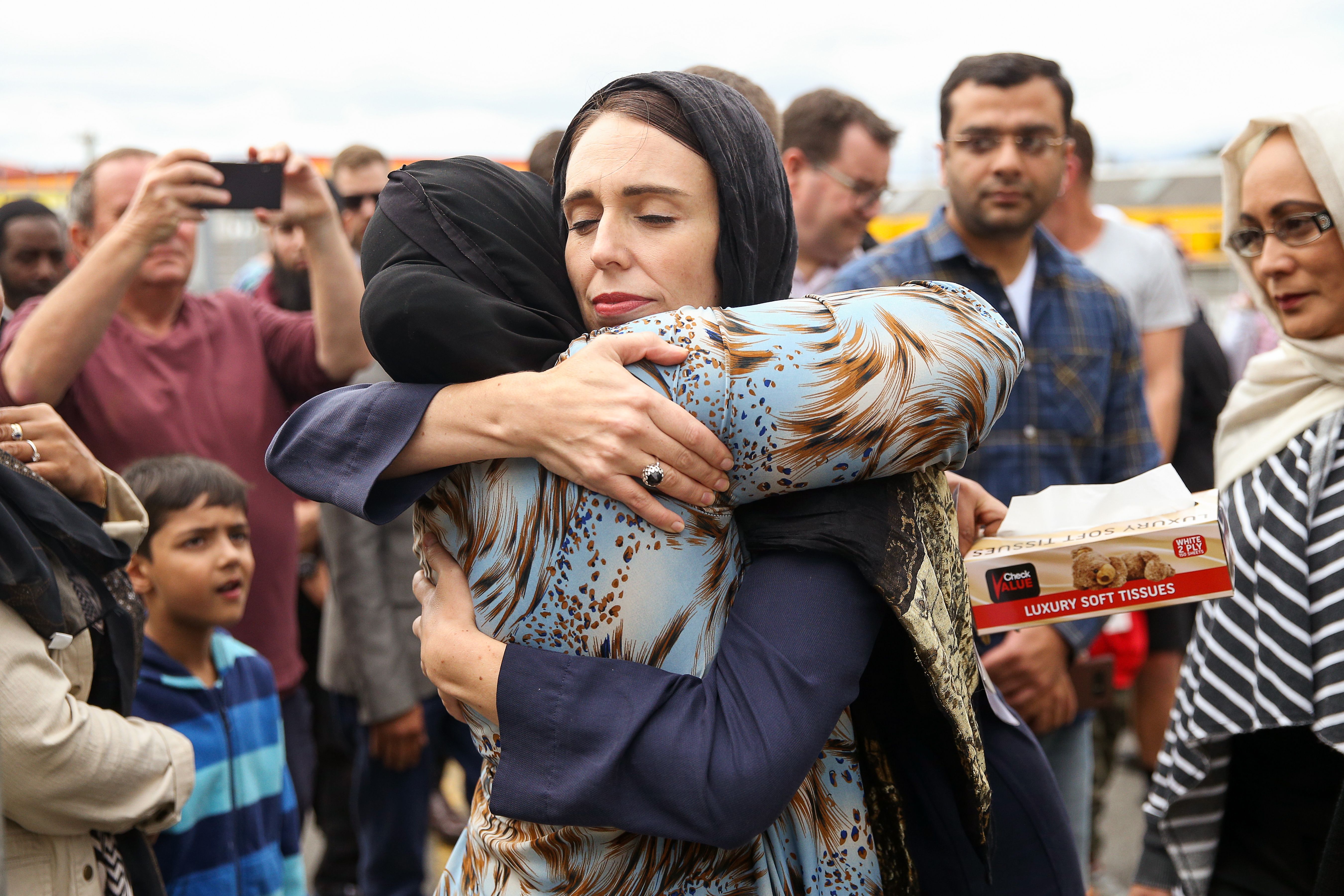 Prime Minister Jacinda Ardern hugs a mosque-goer at the Kilbirnie Mosque on March 17, 2019 in Wellington, New Zealand. 
