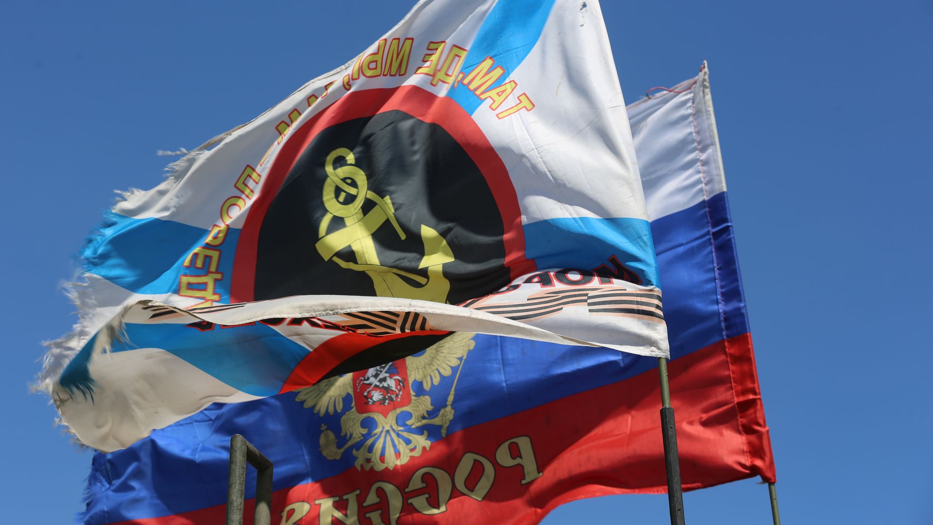 The flag of the Donetsk People's Republic and Russian flag flying in Mariupol, Ukraine, in May 2022.