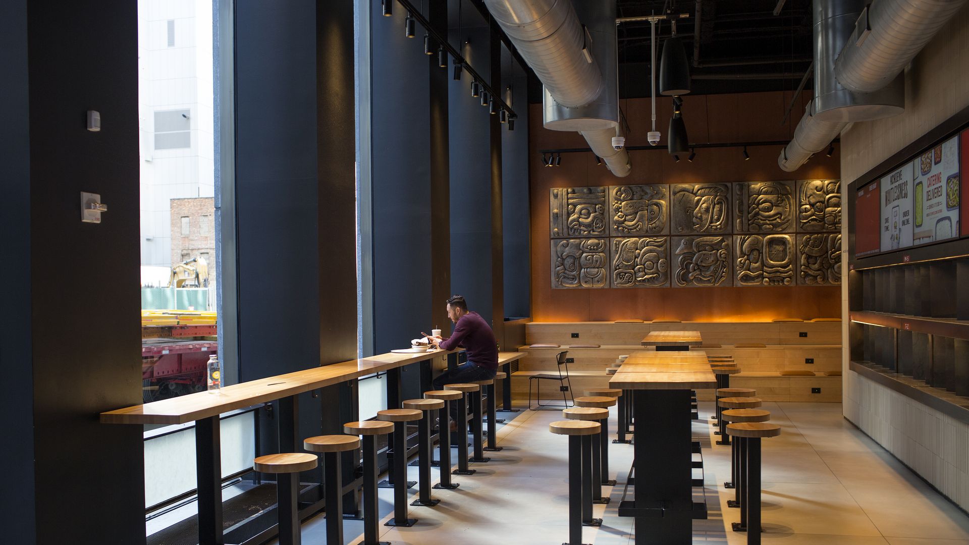 A man eats lunch in a deserted restaurant on March 14, 2020 in New York City.