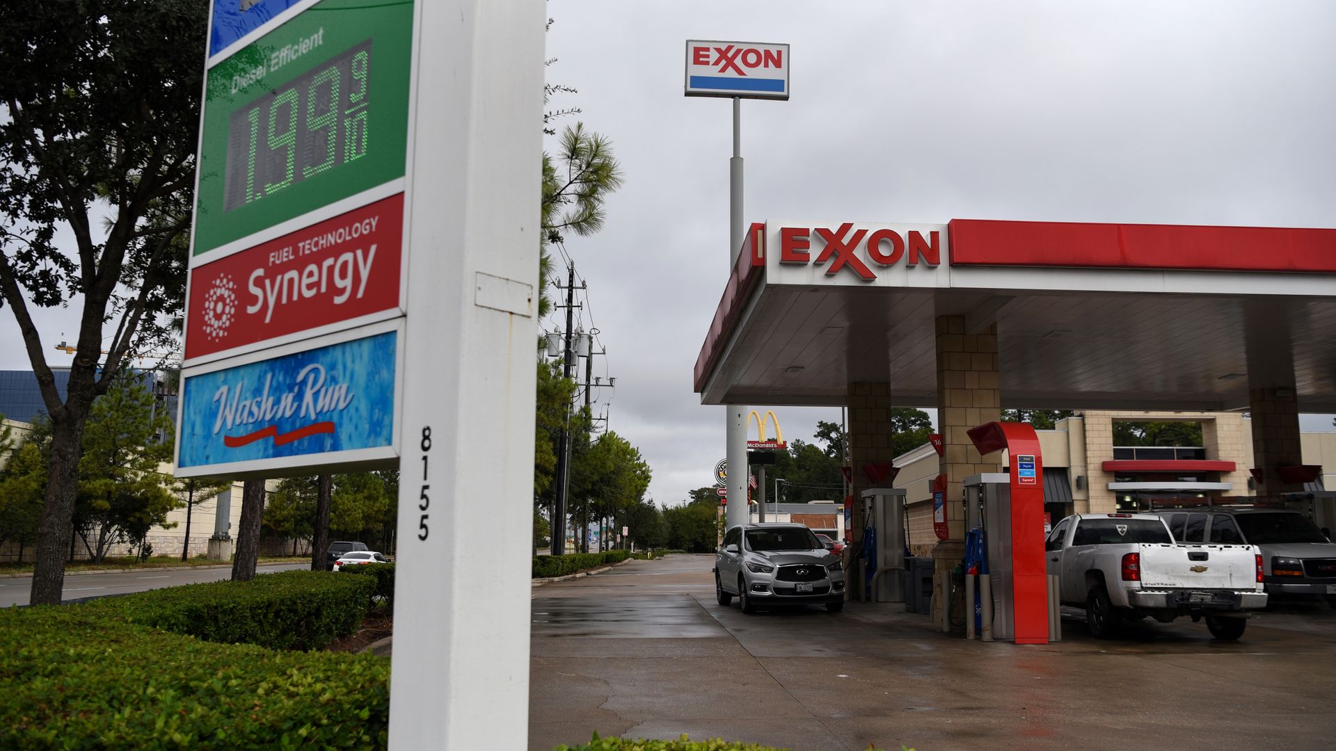 Vehicles refueling at an Exxon Mobil Corp. gas station in Houston, Texas, in October 2020.