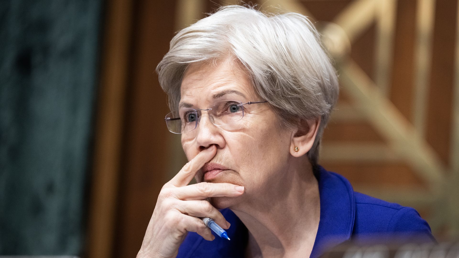 Ranking member Sen. Elizabeth Warren, D-Mass., listens to testimony by Federal Reserve Chairman Jerome Powell during the Senate Banking, Housing and Urban Affairs Committee hearing titled "The Semiannual Monetary Policy Report to the Congress," in Dirksen building on Wednesday, June 25, 2025.