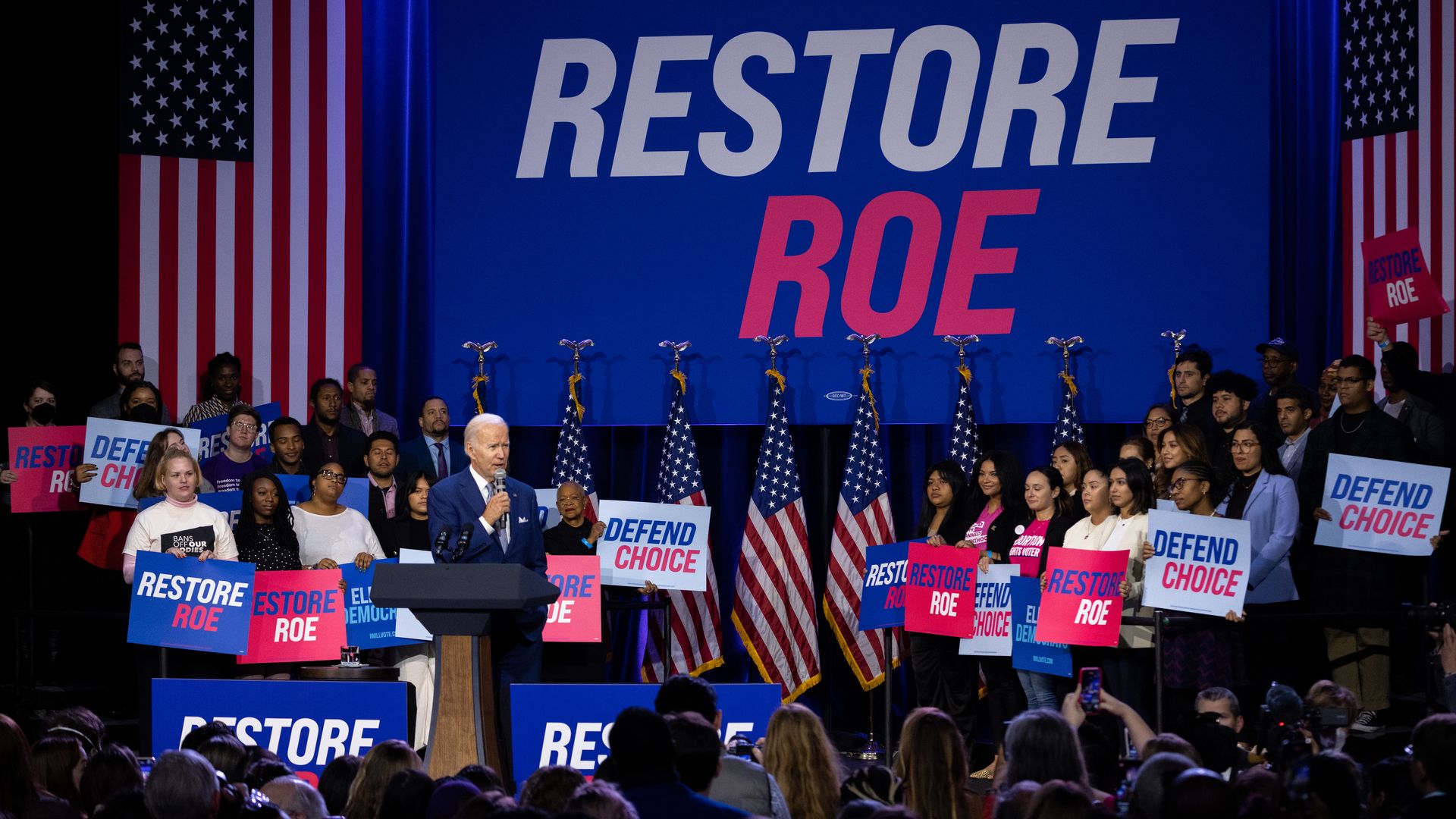 Biden in front of a 