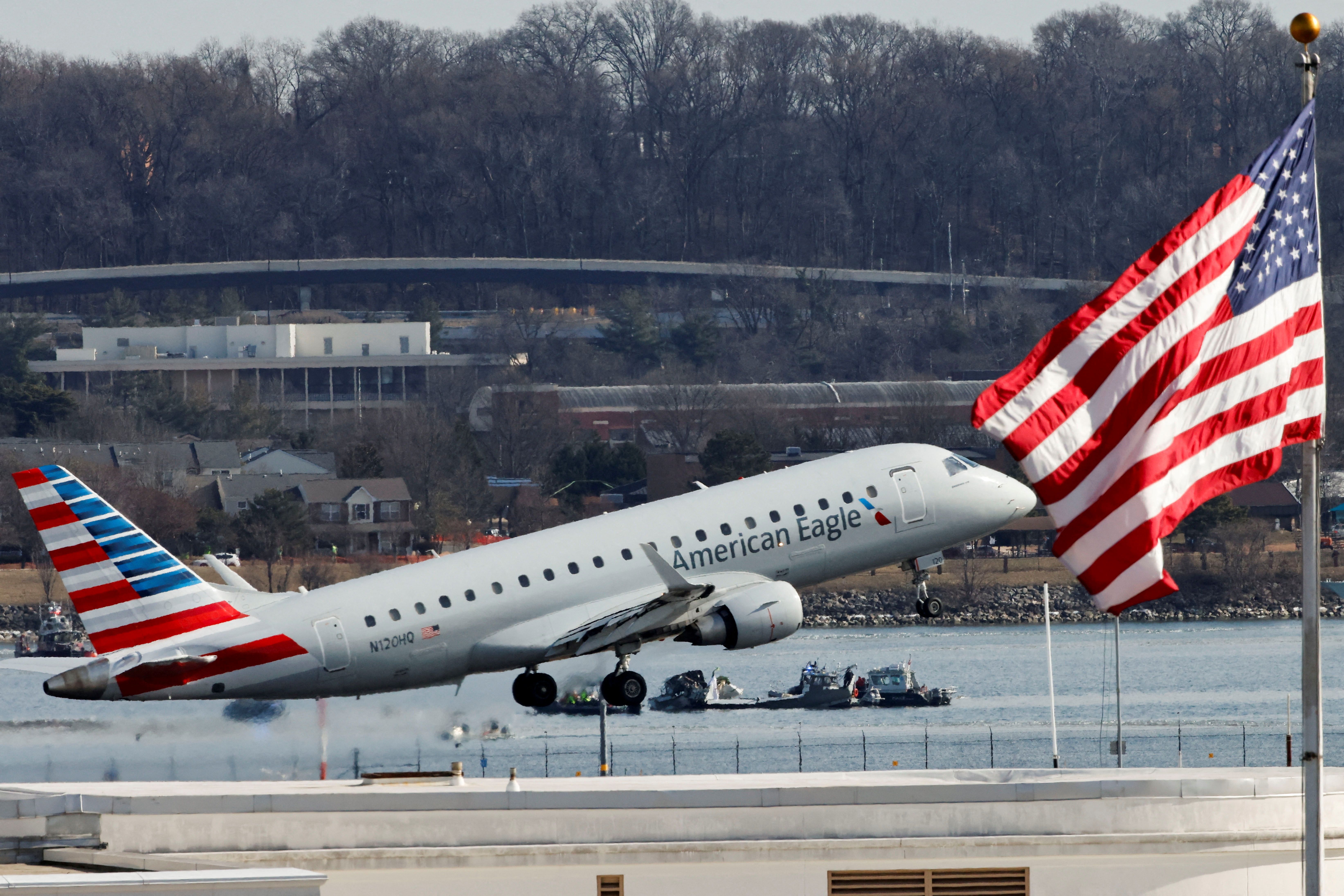 An American Eagle plane takes off at Reagan National Airport after it reopened yesterday.