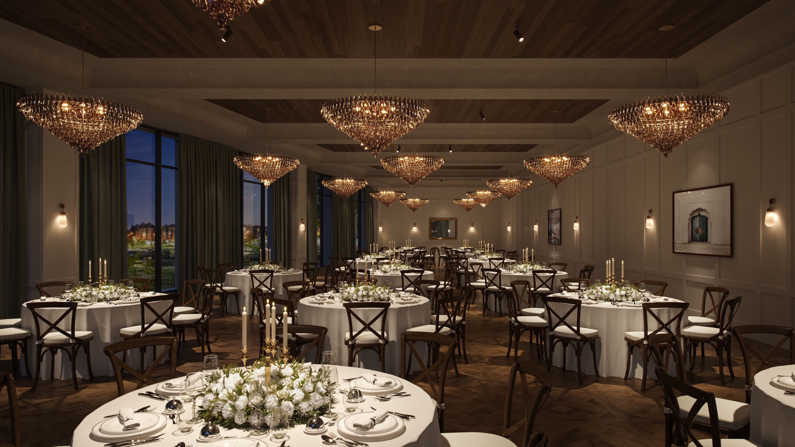 A rendering of an events space with white-linen dining tables and chandeliers 