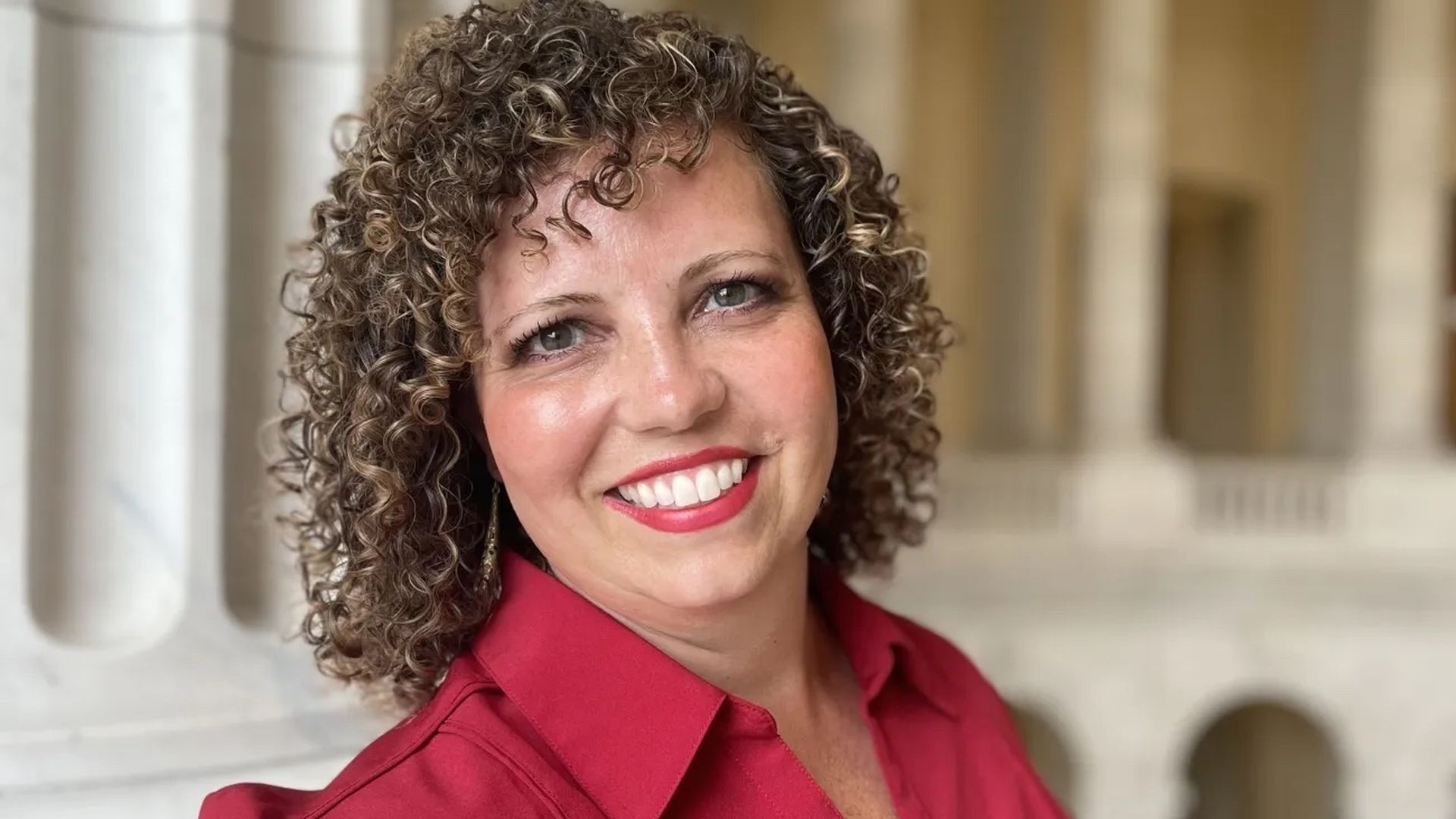  Celeste Maloy wears a red shirt.