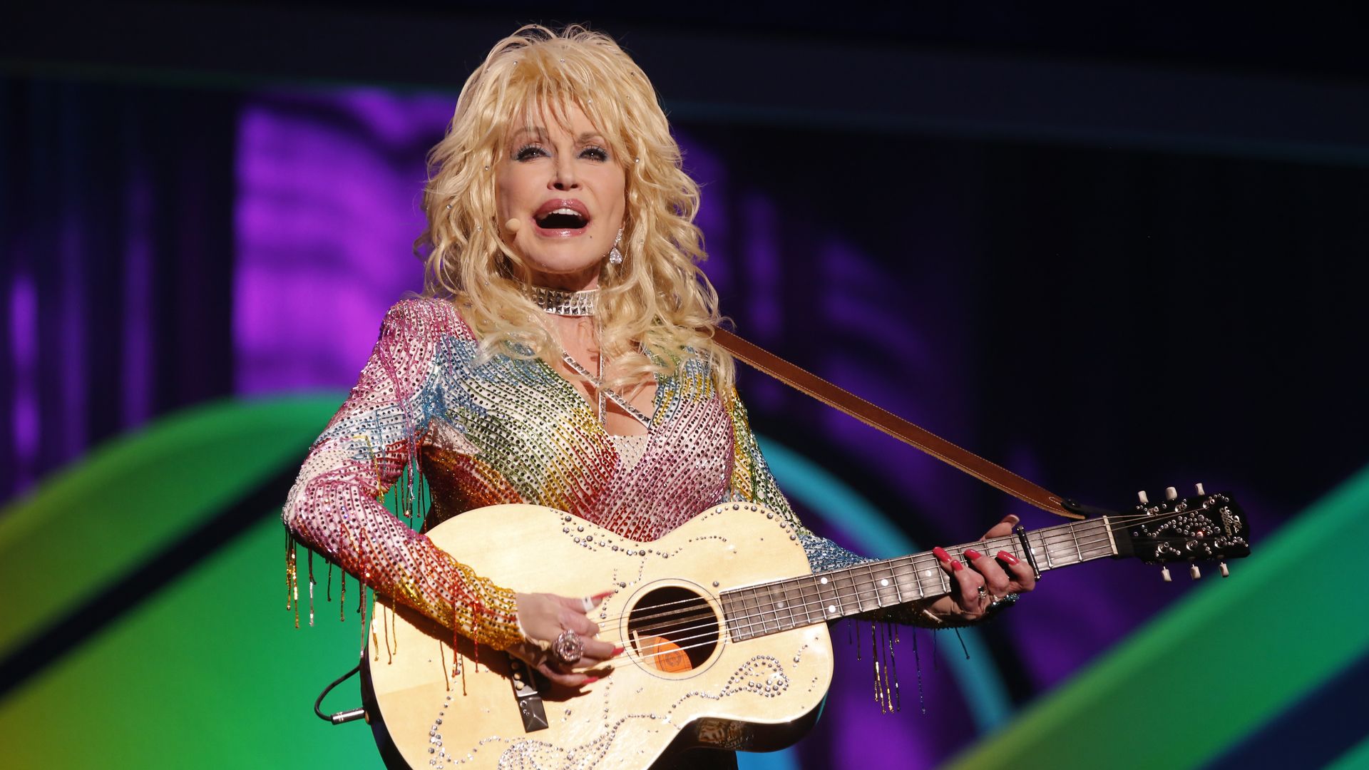 Dolly Parton in a glittering dress.