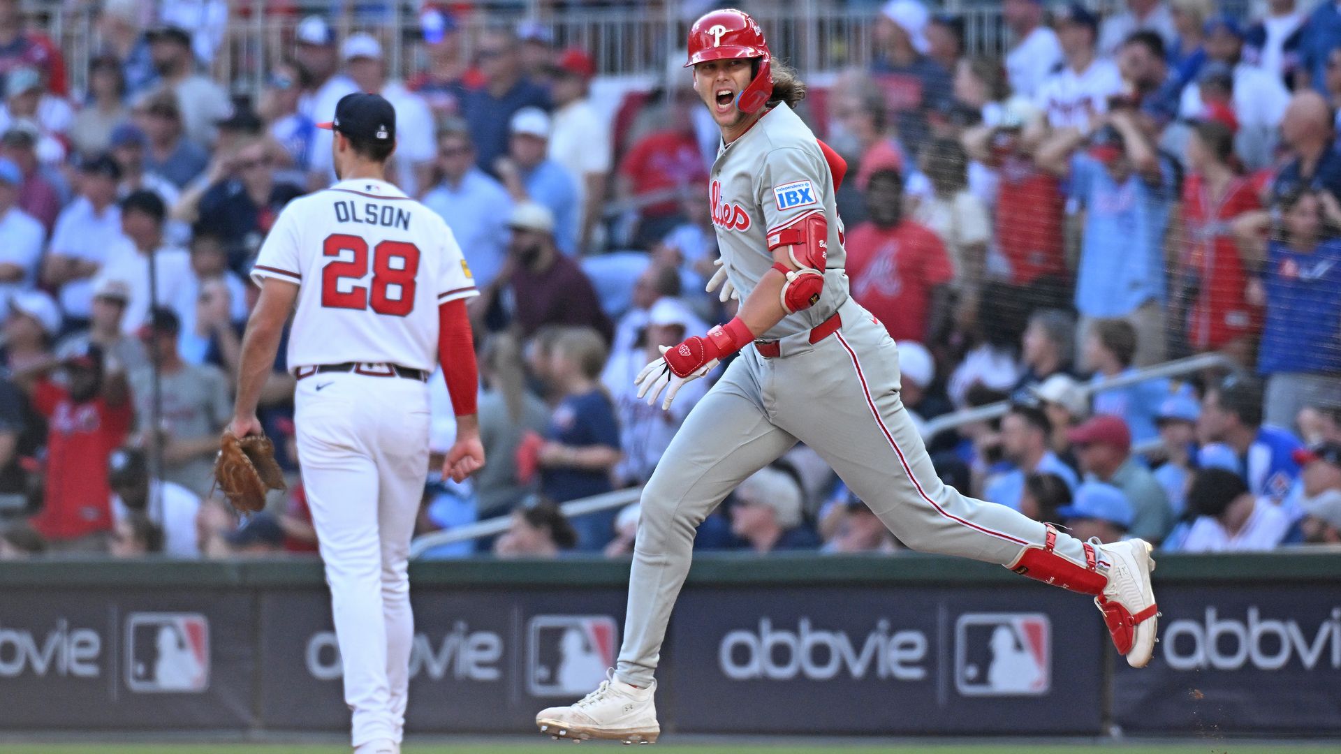 Alec Bohm rounds the bases after homering in the 10th inning of Game 2 in the Phillies wild card playoff win over the Braves.
