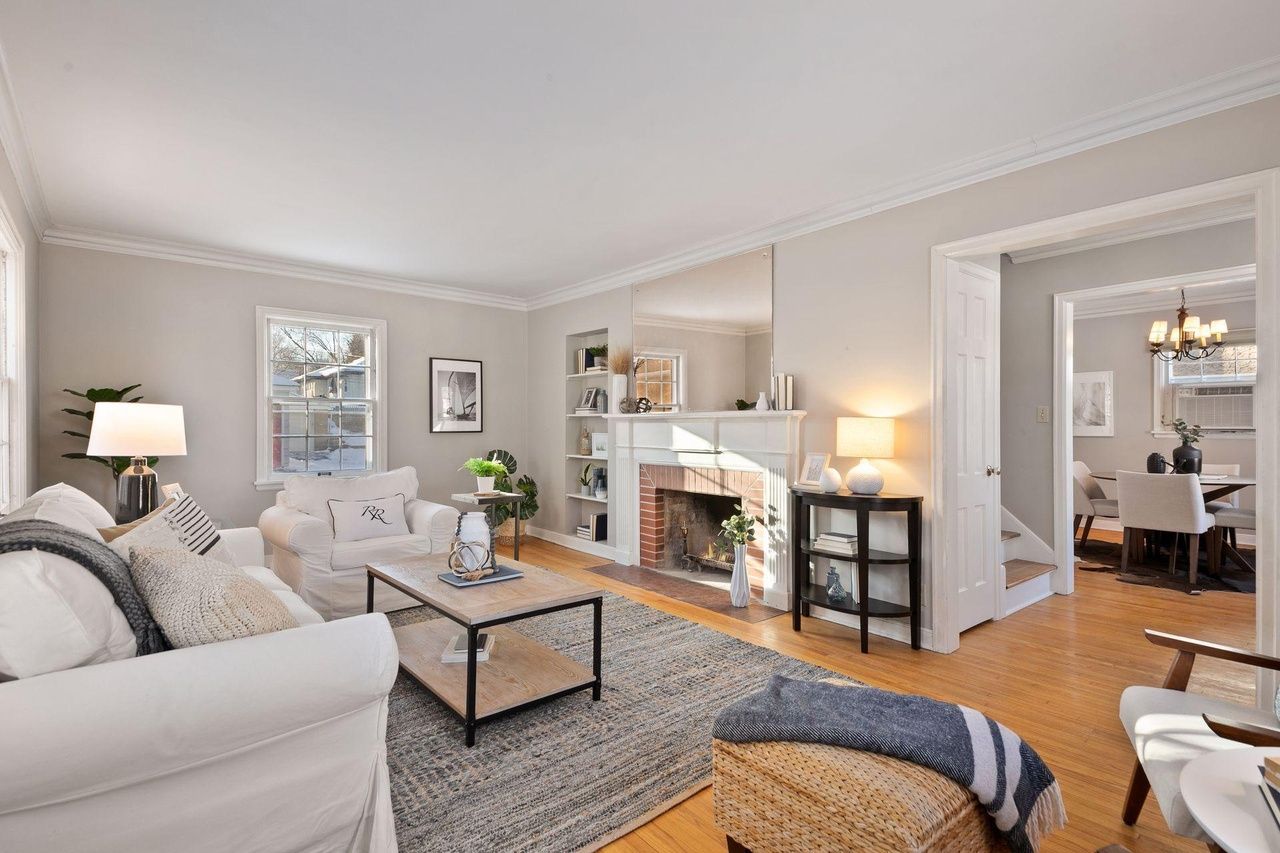 spacious living room with view of dining room