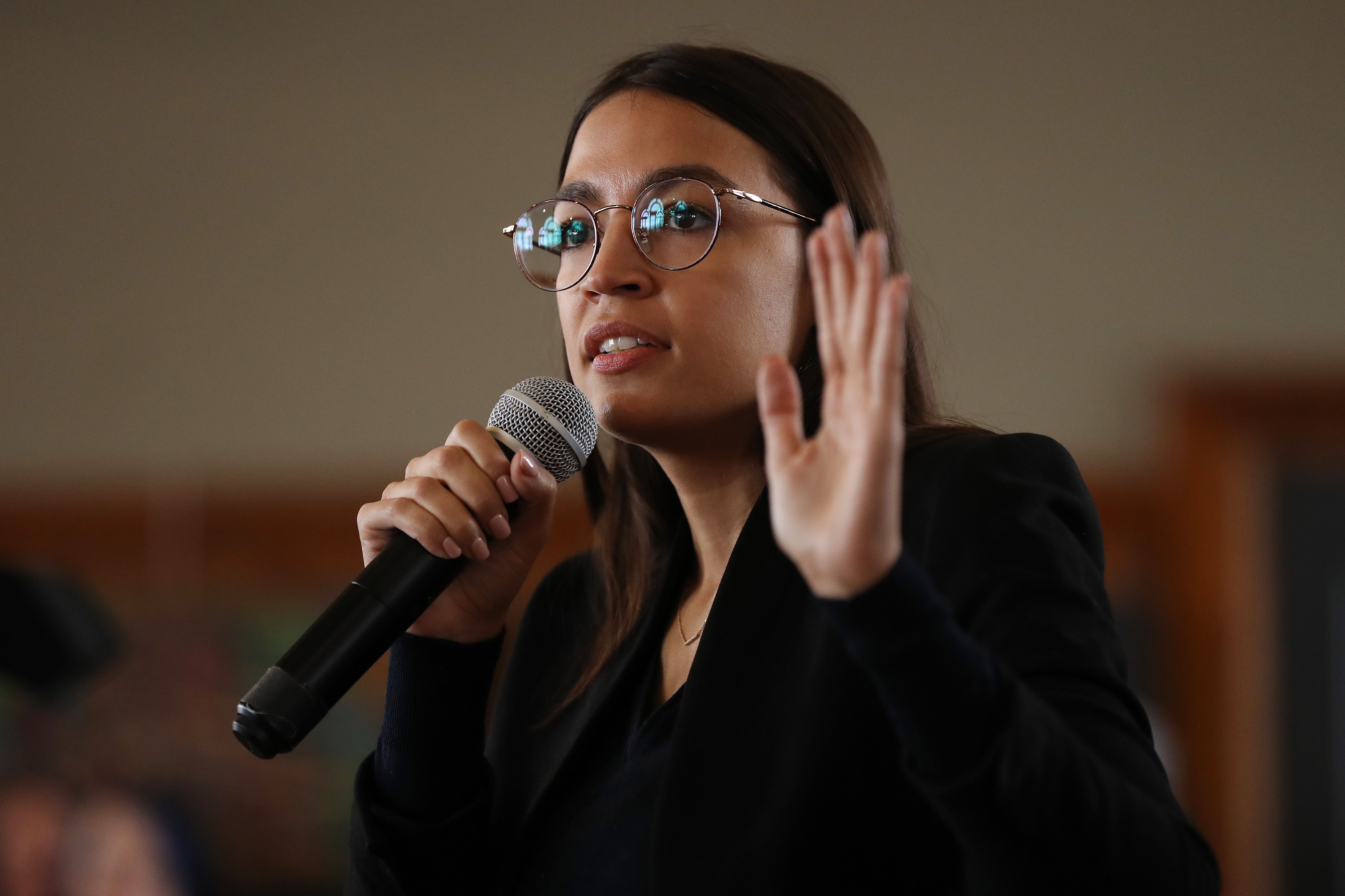 AOC joins Biden climate change task force - Axios