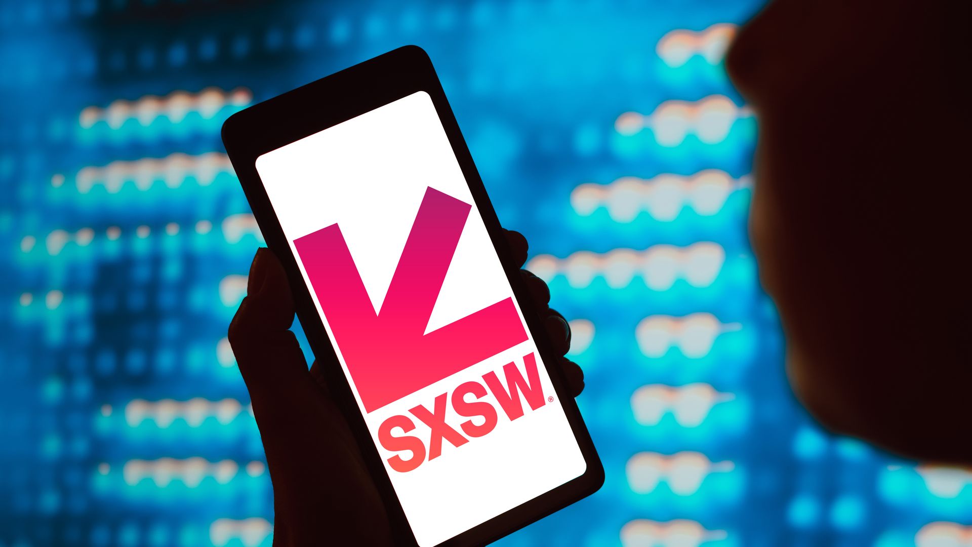 An illustration of SXSW's logo on a cellphone.
