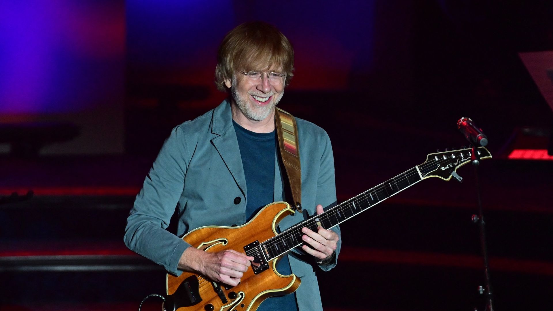 Trey Anastacio of Phish performs on stage. 