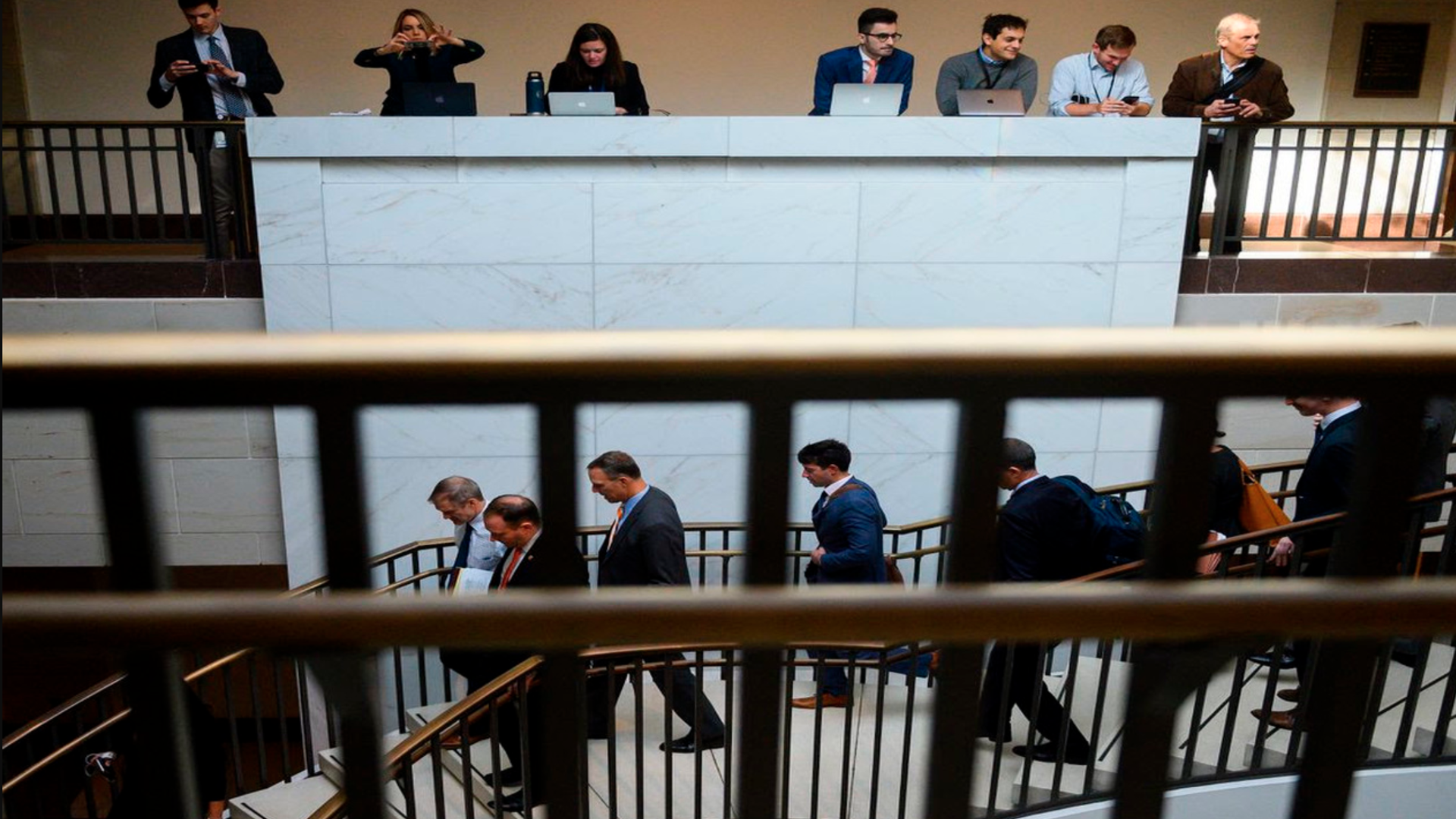 A view of reporters overlooking Rep. Jim Jordan.
