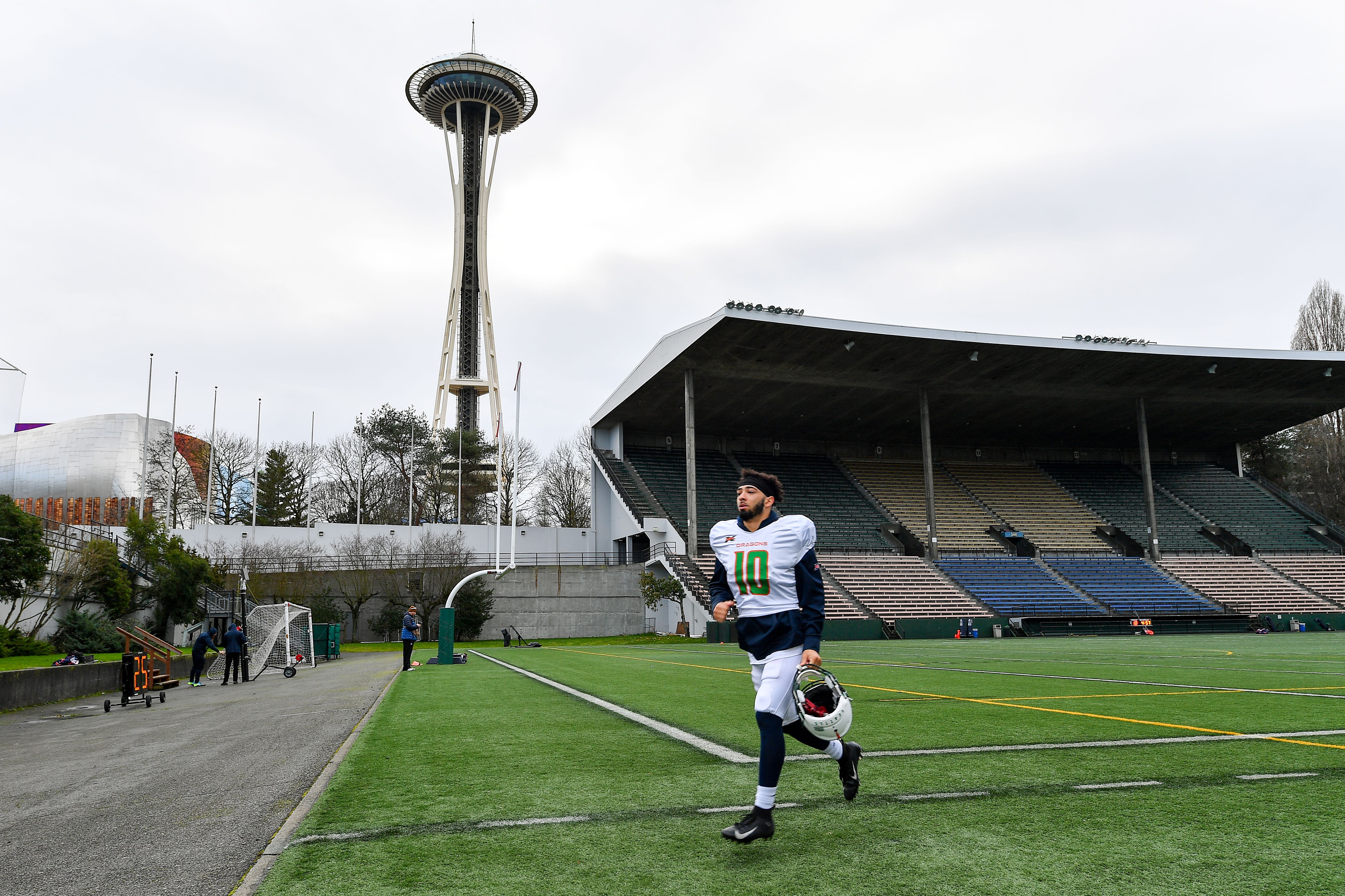 An SEATTLE, WASHINGTAn XFL Seattle Dragons player runs to the locker room after practice at Memorial Stadium in 2020. 