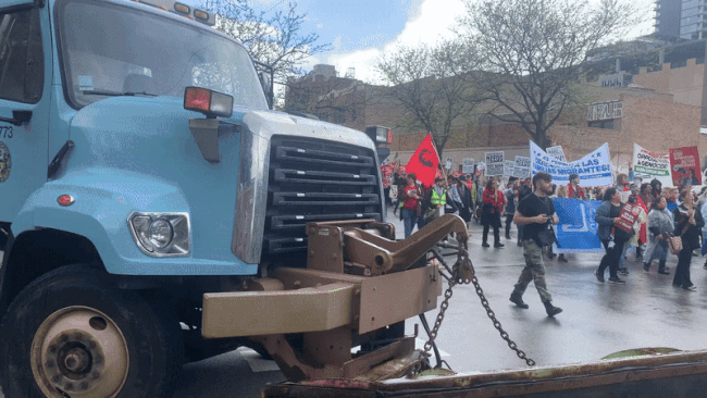 Photo of a protest on a street. 