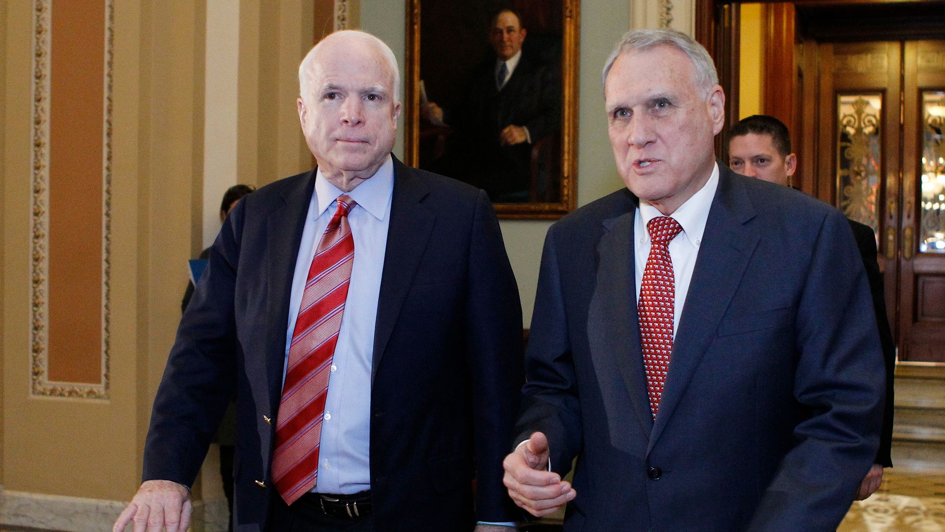 John McCain and Jon Kyl walking in Senate.