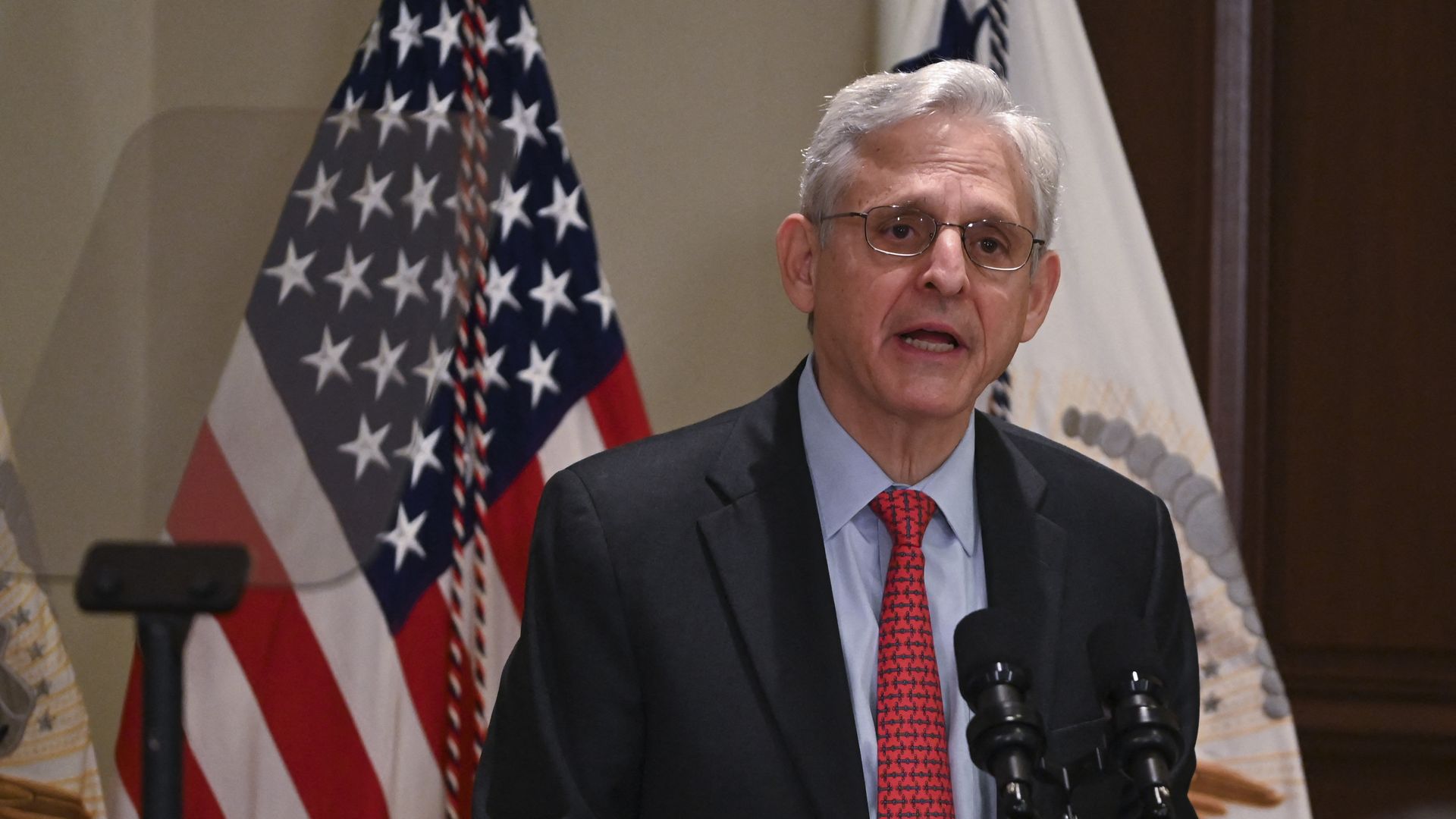 Photo of Merrick Garland speaking from a podium