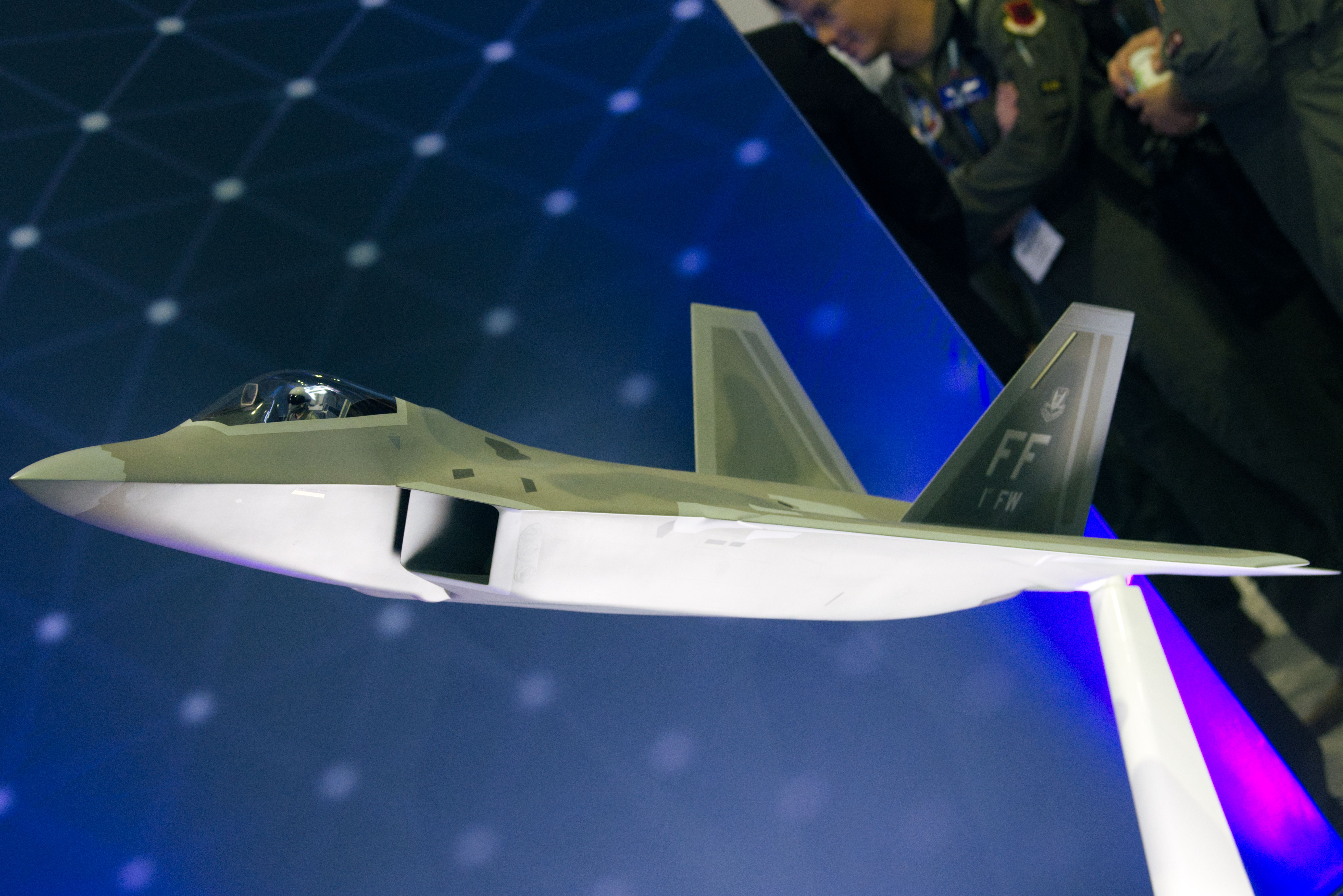A 1/10th-scale F-22 model at the Lockheed Martin booth.
