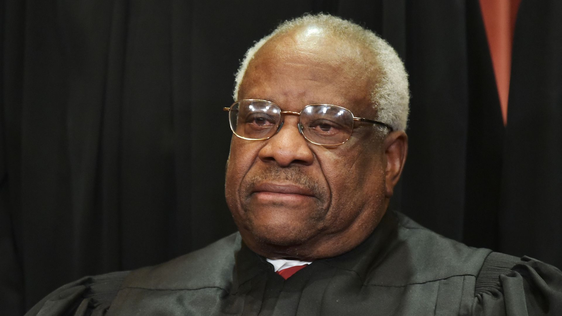 Associate Justice Clarence Thomas poses for the official group photo at the US Supreme Court in Washington, DC on November 30, 2018.