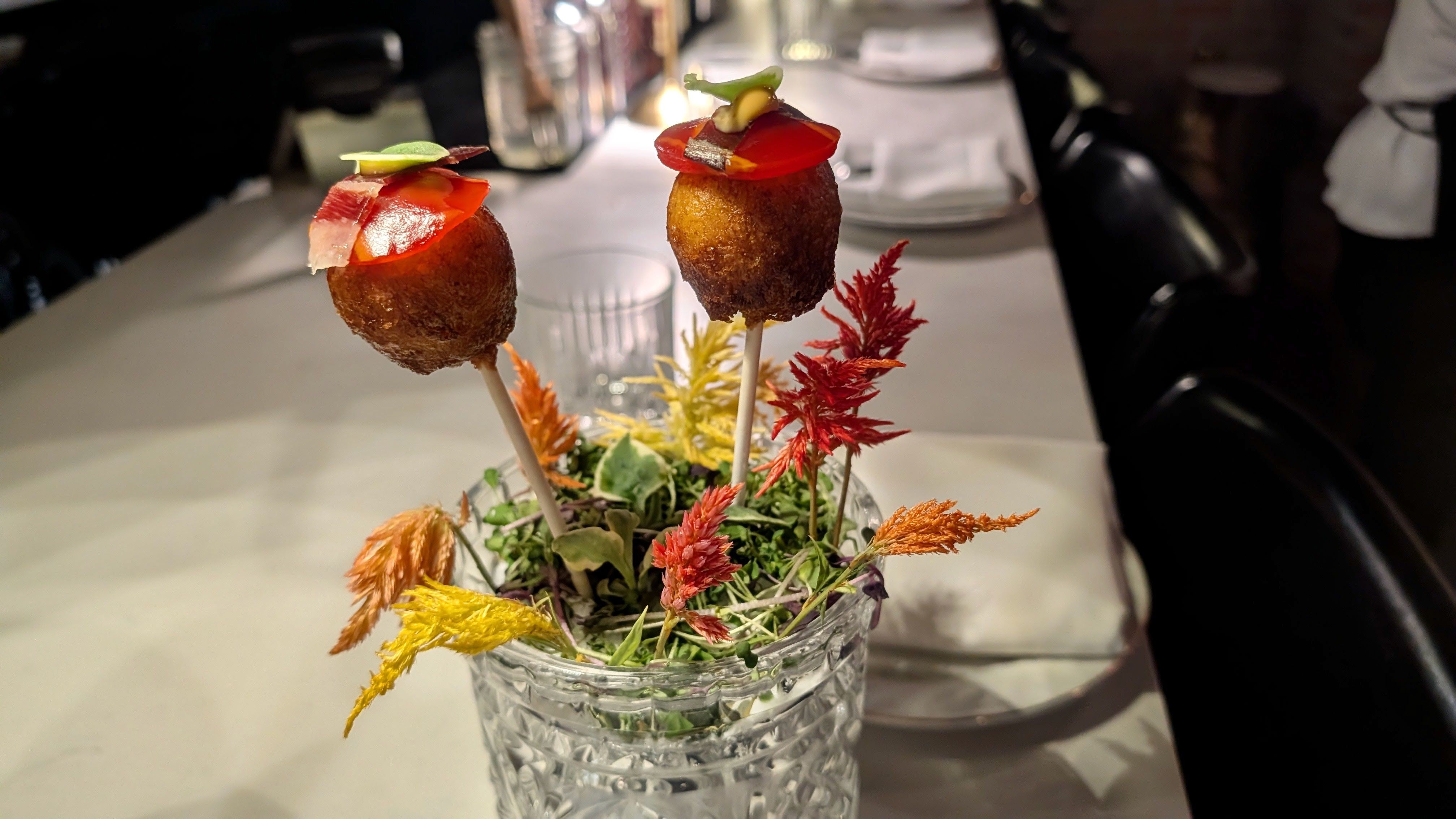 Lobster beignets. Photo: Erin Alberty/Axios