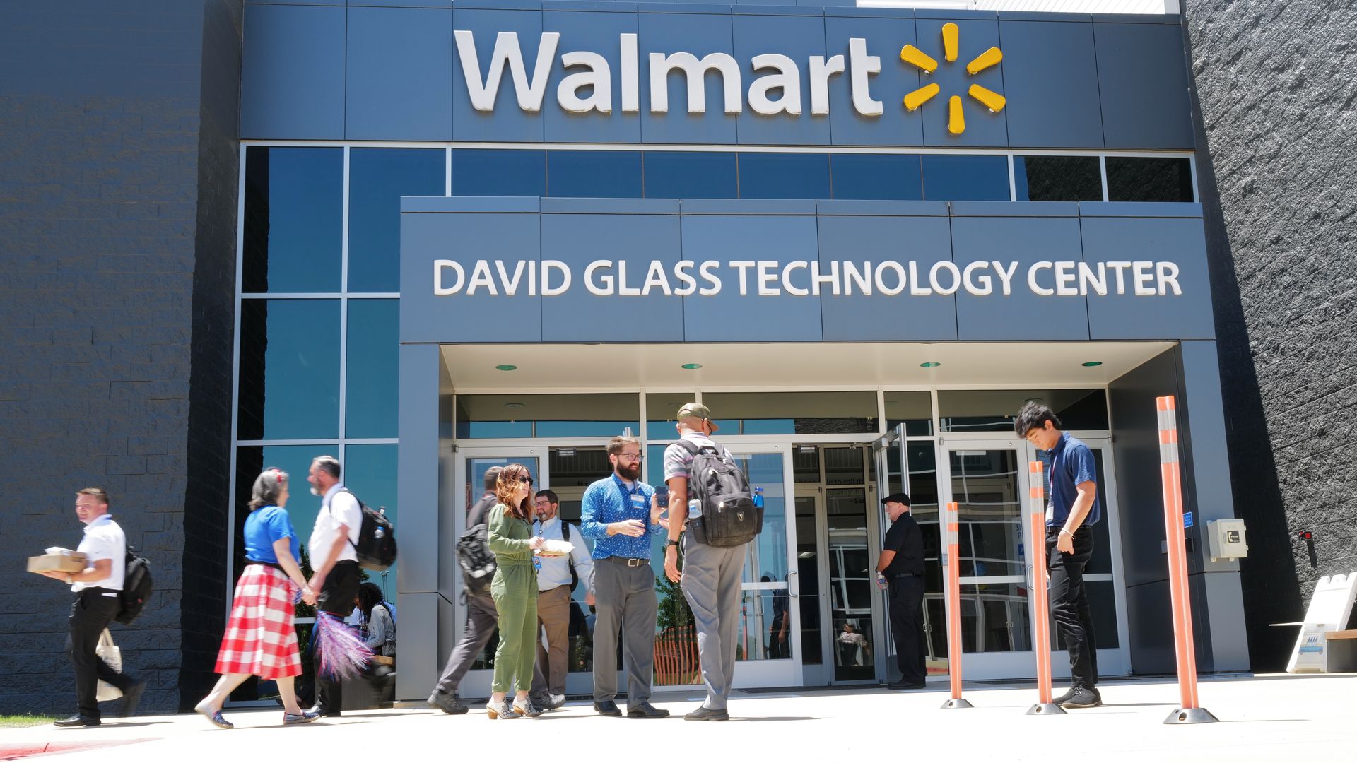 Hopeful entrepreneurs and Walmart employees mix at noontime during the company's annual "Open Call" event. 