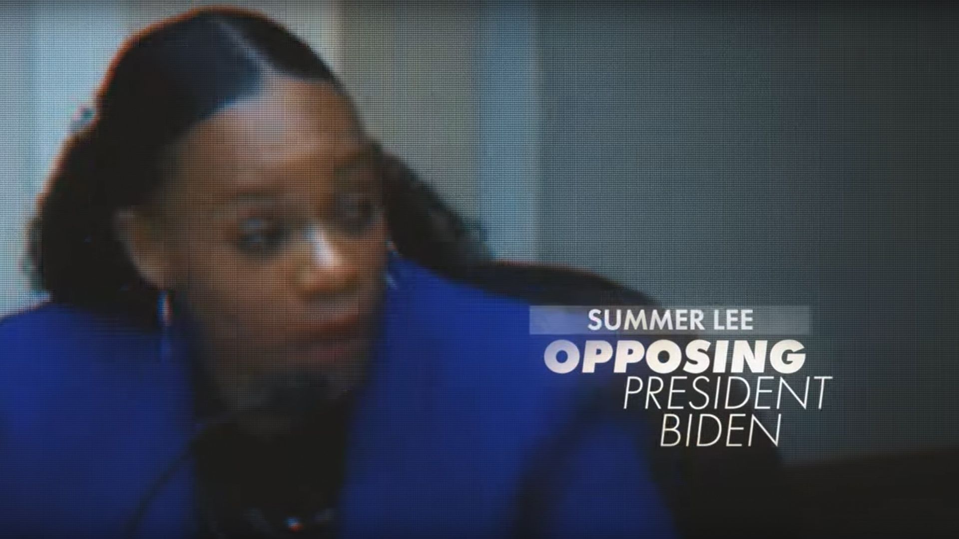 Grainy screen shot of a video of Rep. Susan Lee with text over her shoulder