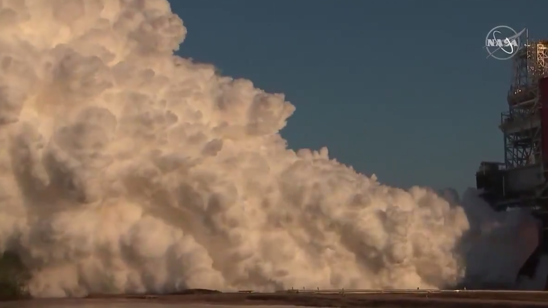 A cloud of smoke produced by a test firing of NASA's Space Launch System rocket