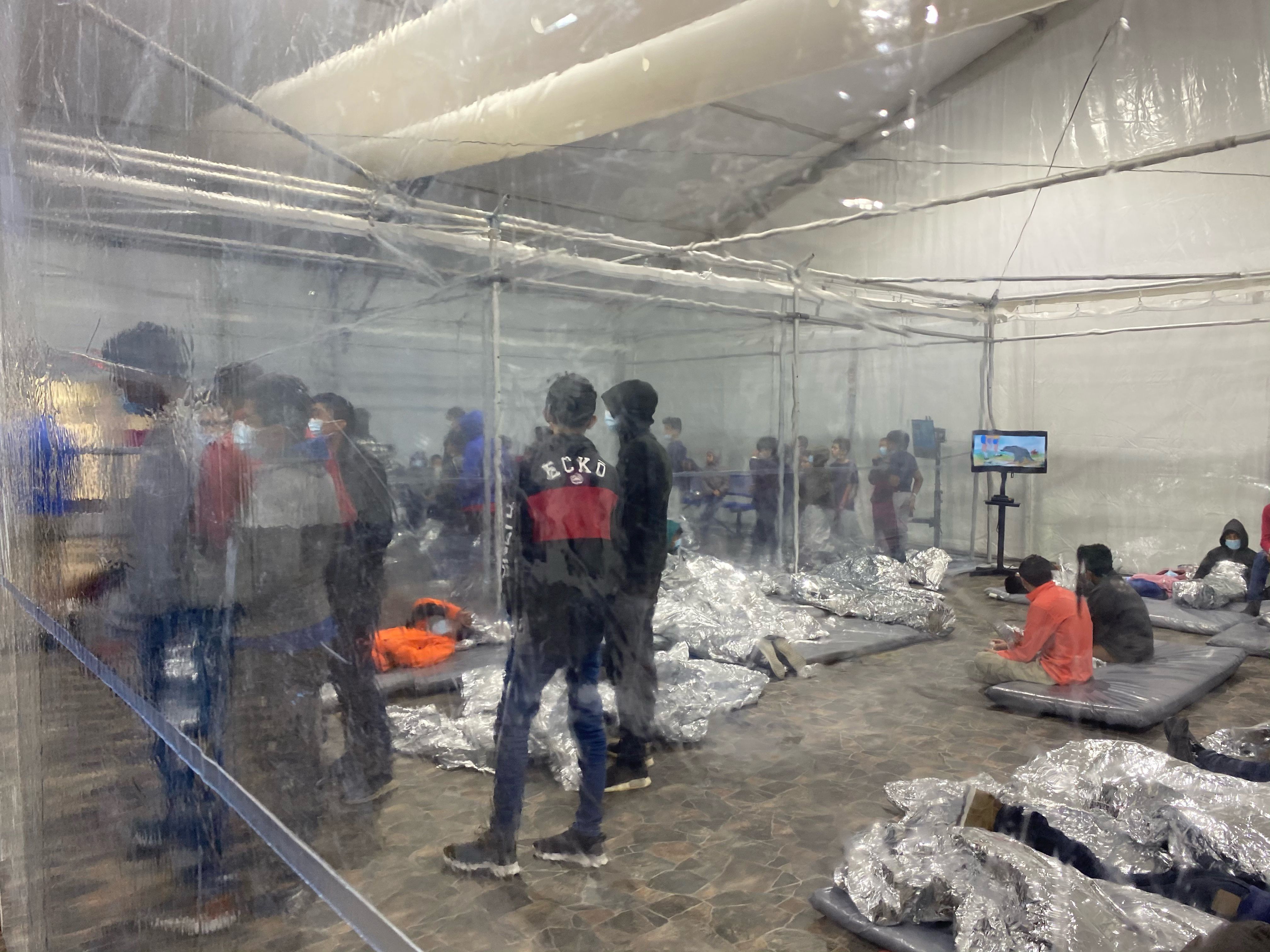 Migrants crowded in border facility in Donna, Texas