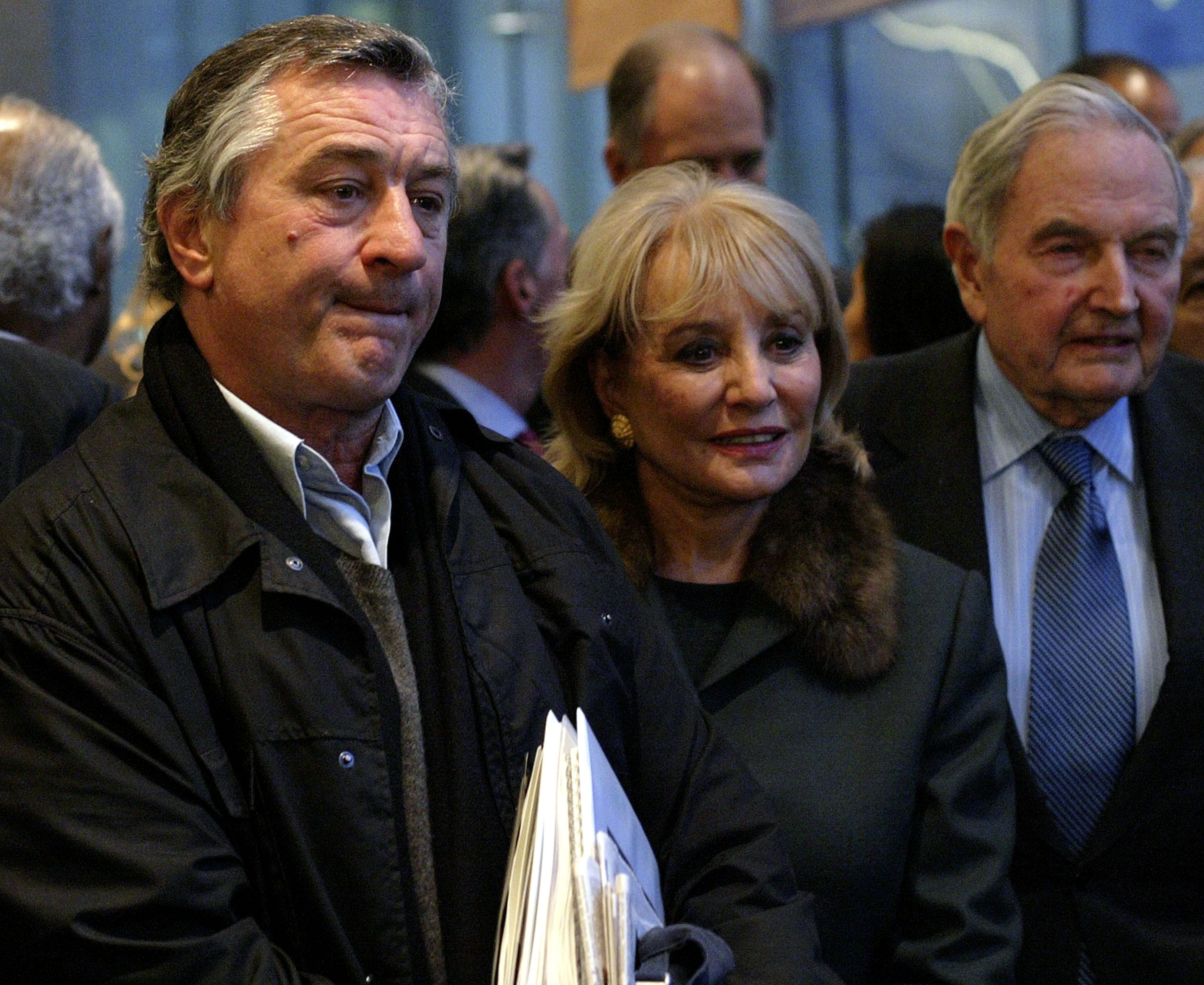  actor Robert DiNiro; Barbara Walters; and David Rockefeller, former chairman of Chase Manhattan Bank, attend a news conference.