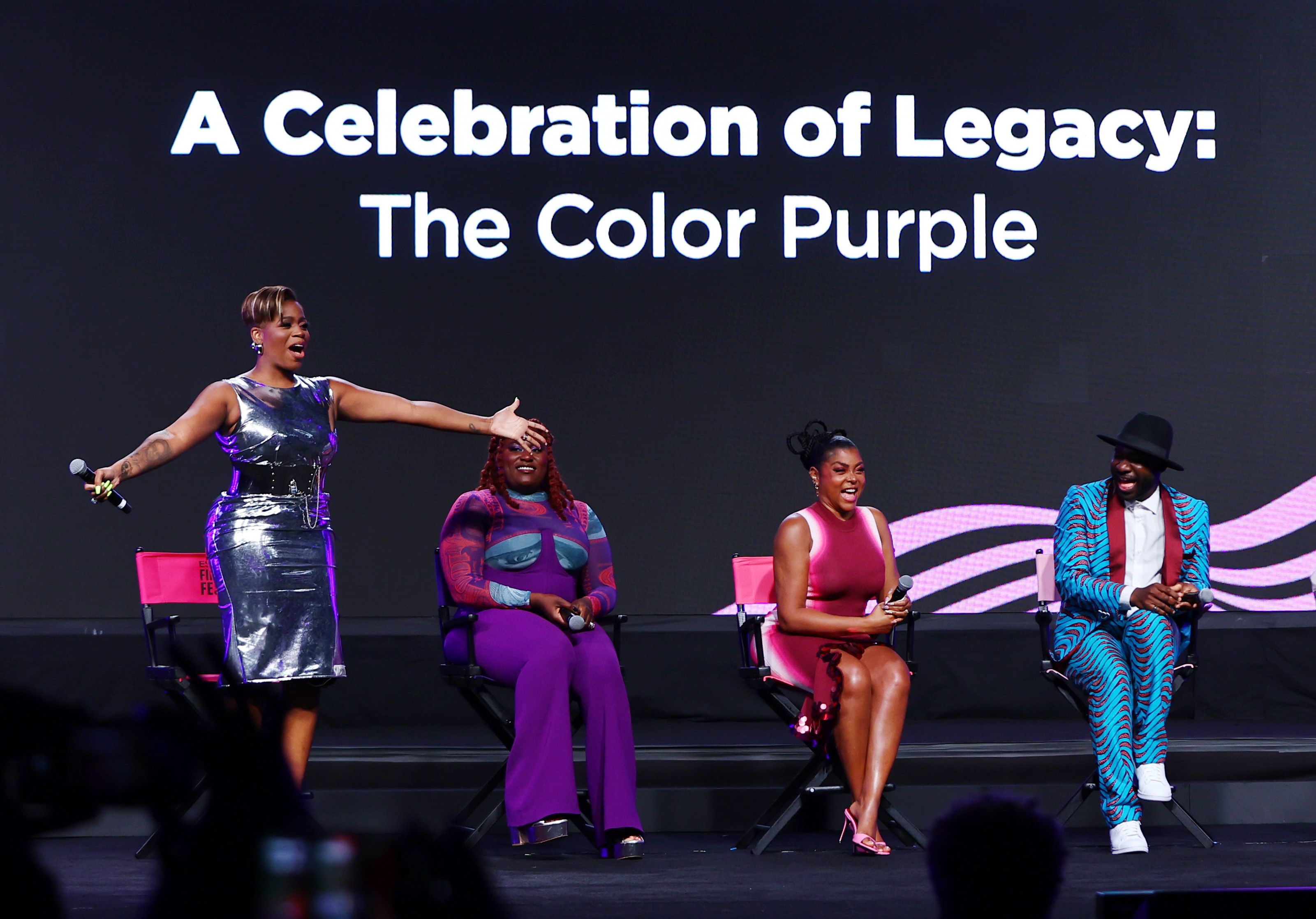 Photo shows the cast of the 2023 version of "The Color Purple" on stage at Essence: Fantasia Barrino, Danielle Brooks, Taraji P. Henson and Blitz Bazawule.