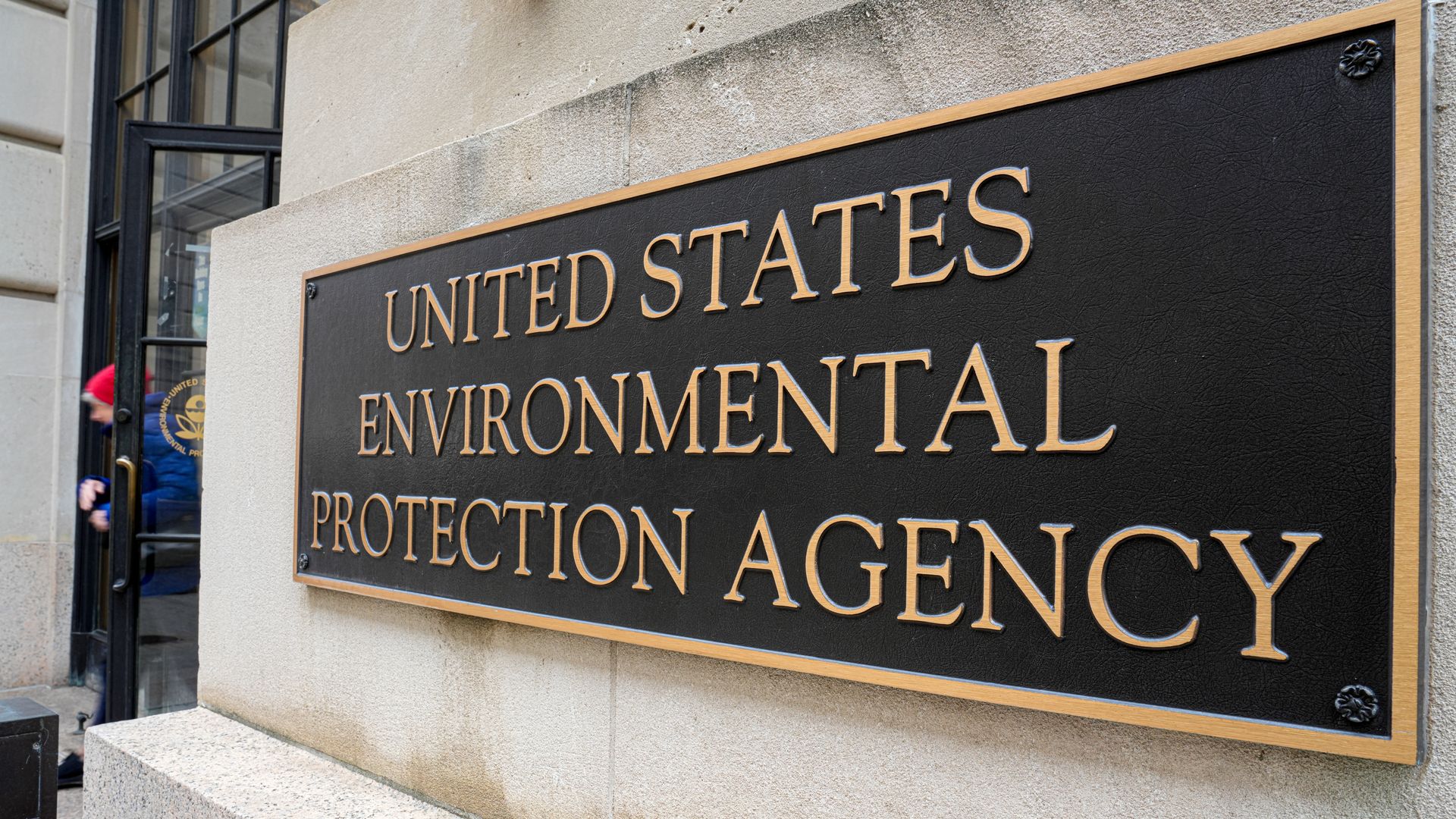 A bronze sign marks an entrance to the US Environmental Protection Agency (EPA) headquarters building on January 30, 2024, in Washington, DC. 