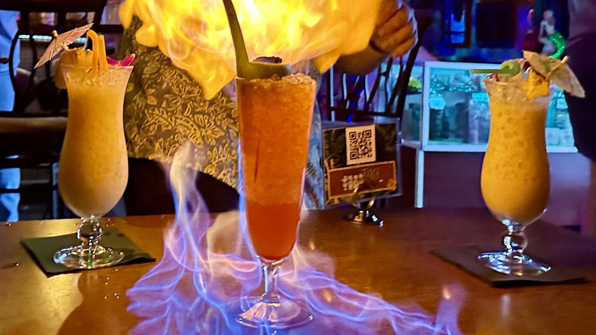 A tiki drink on fire