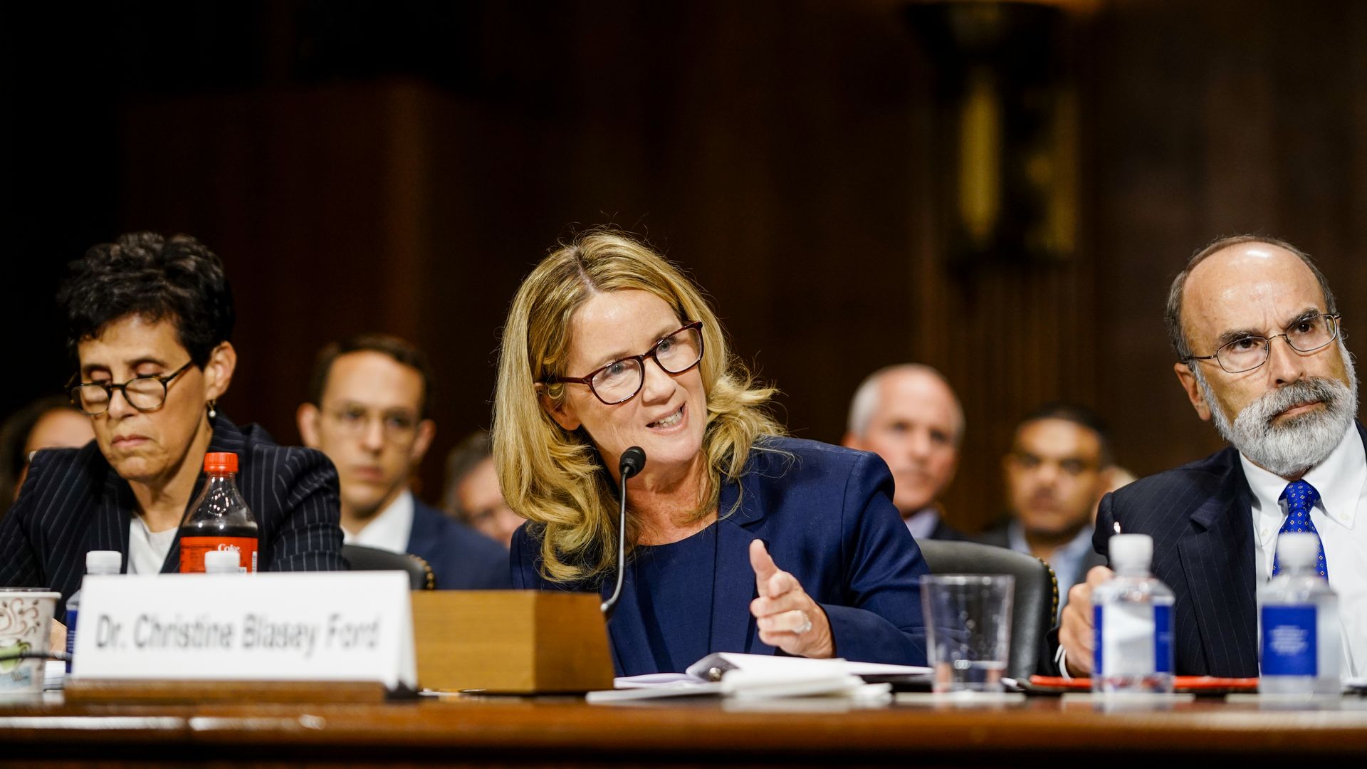 Christine Blasey Ford sitting at a table during the senate hearing.