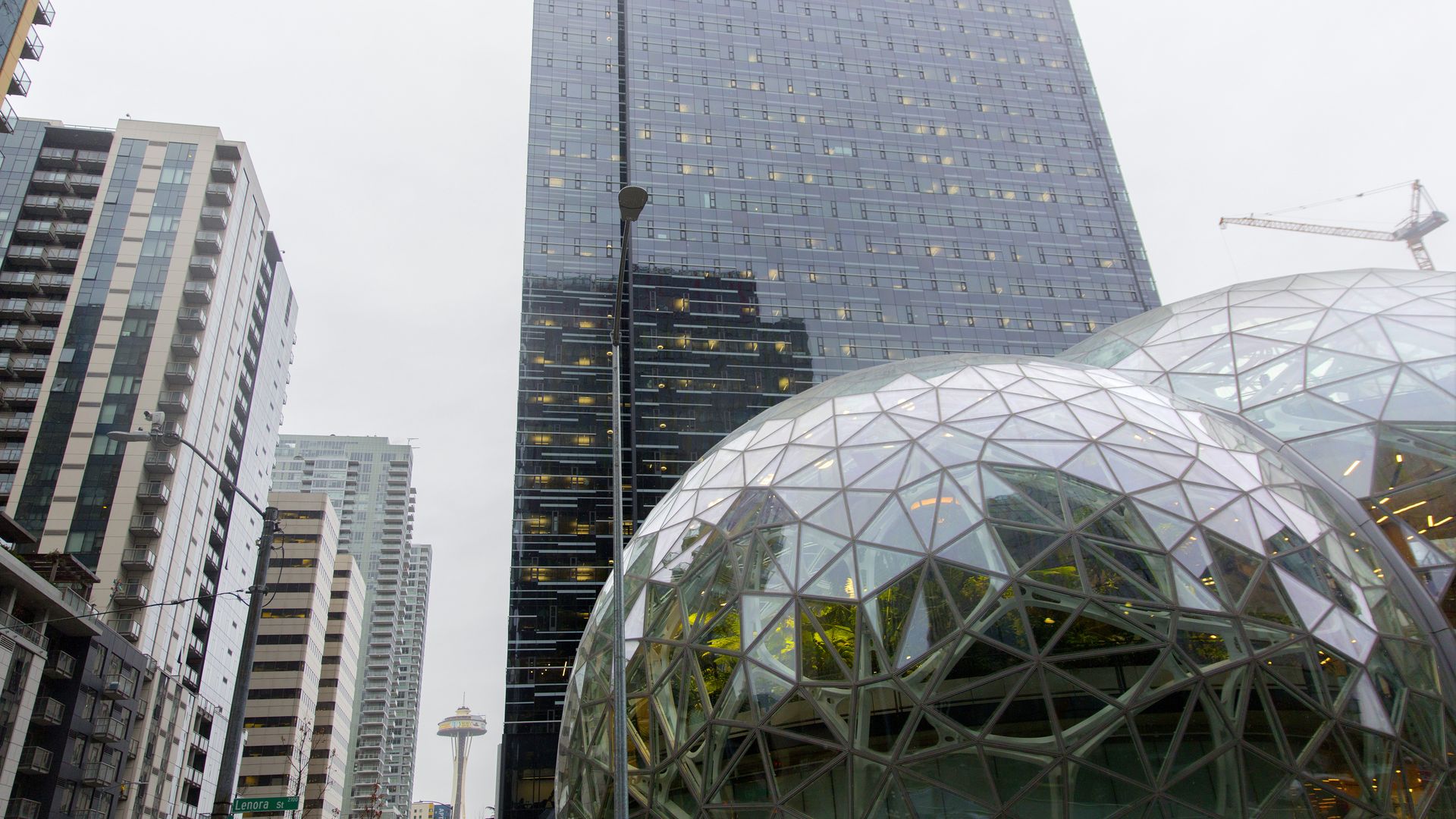 A view of the Amazon Spheres with the Space Needle in the background. 