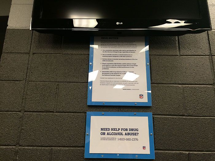 signs in panthers locker room