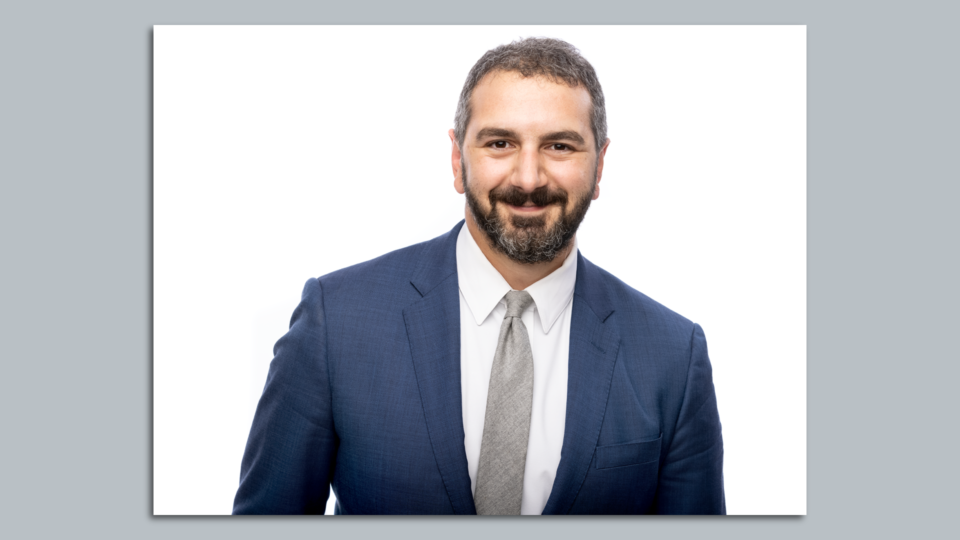 A headshot photo of Michael Corey