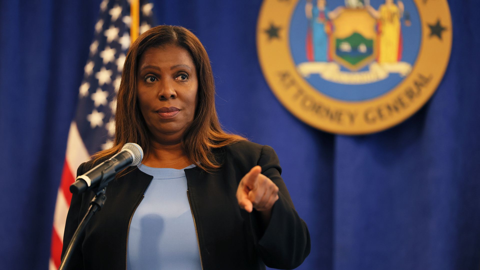 New York Attorney General Letitia James pointing during a press conference.