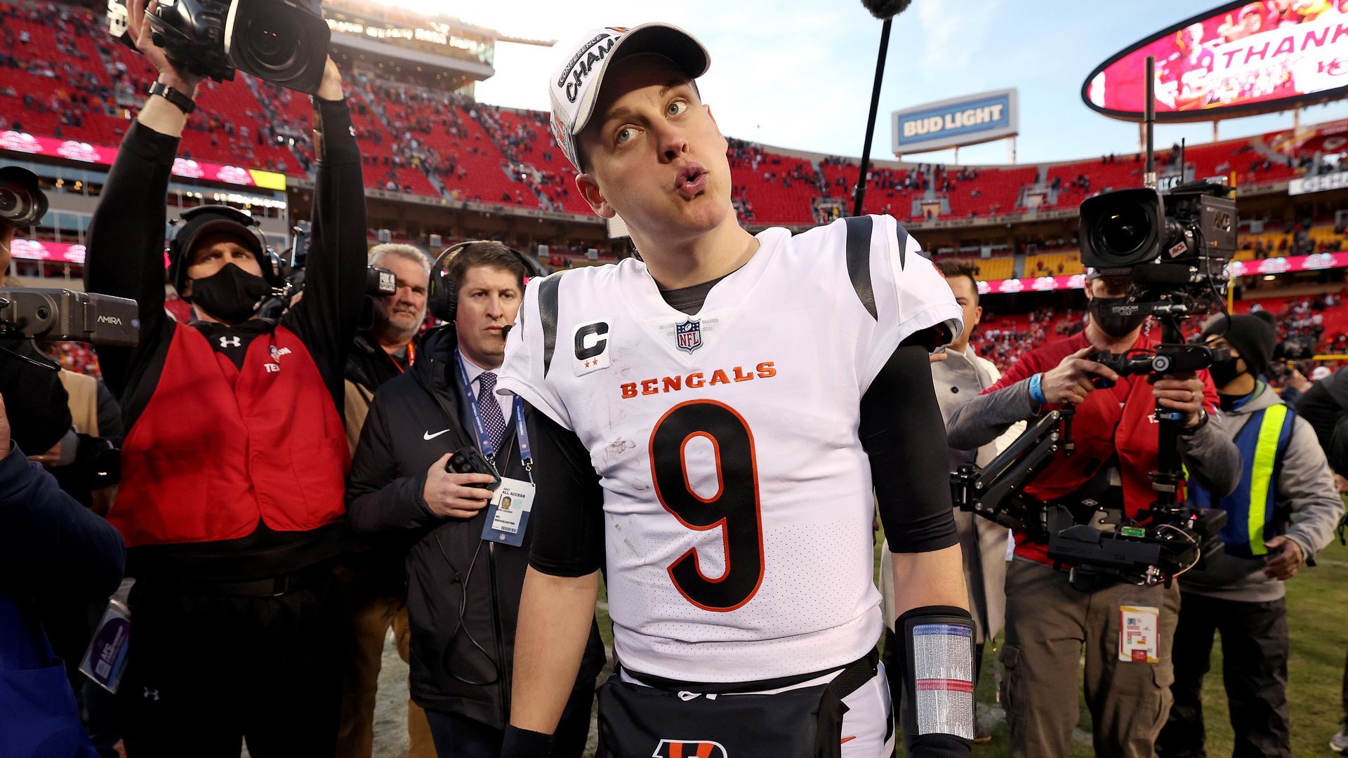 Joe Burrow surrounded by reporters after Sunday's game.