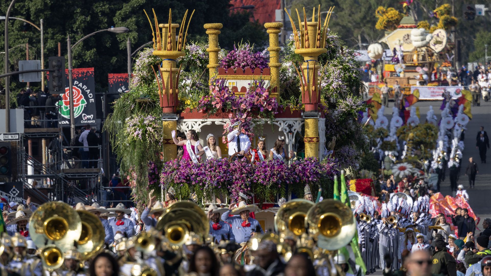 Photo shows Louisiana's float in the 2023 Rose Parade led by a marching band