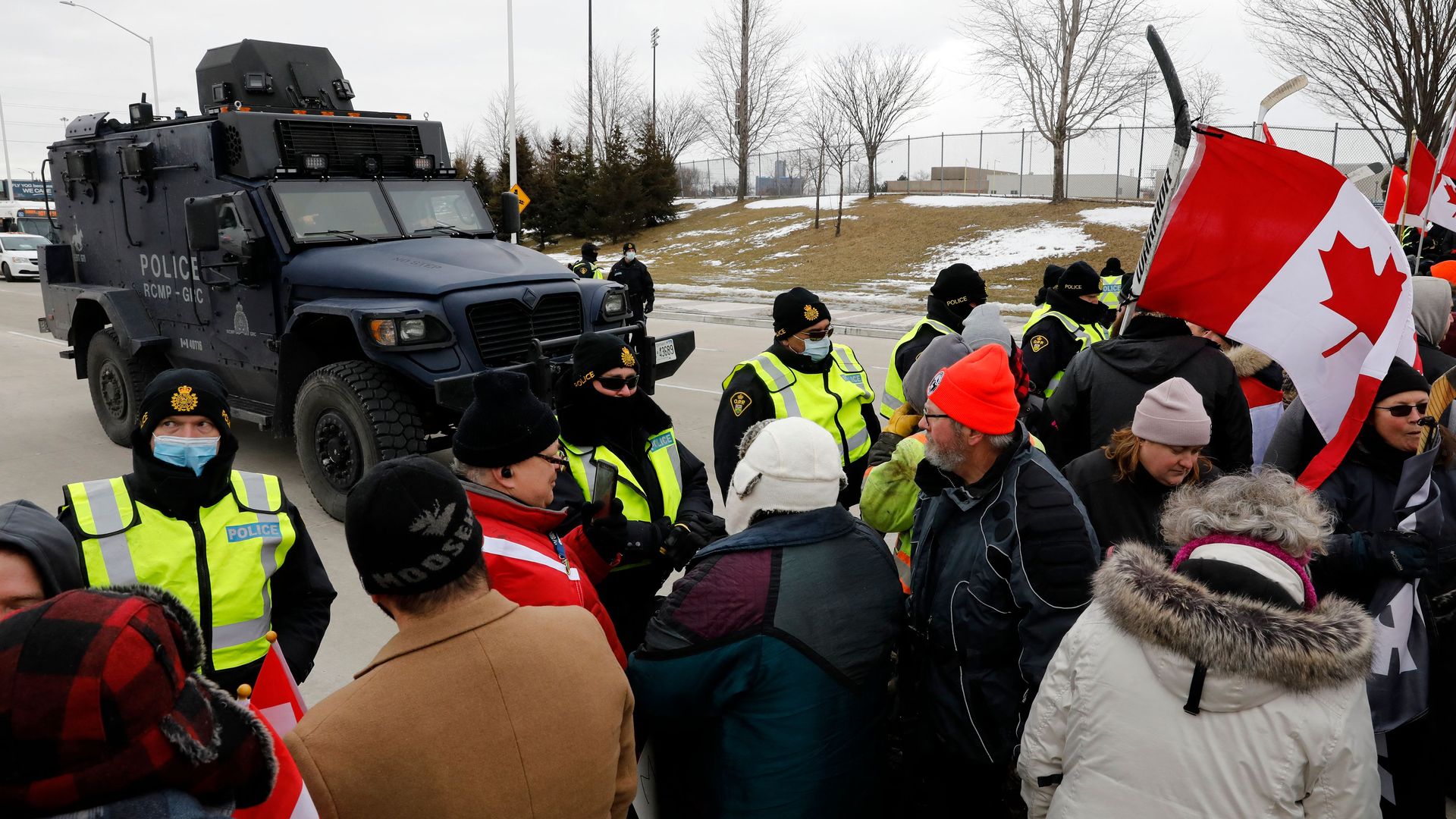 Protestors stopped by police as they block the entrance to the Ambassador Bridge