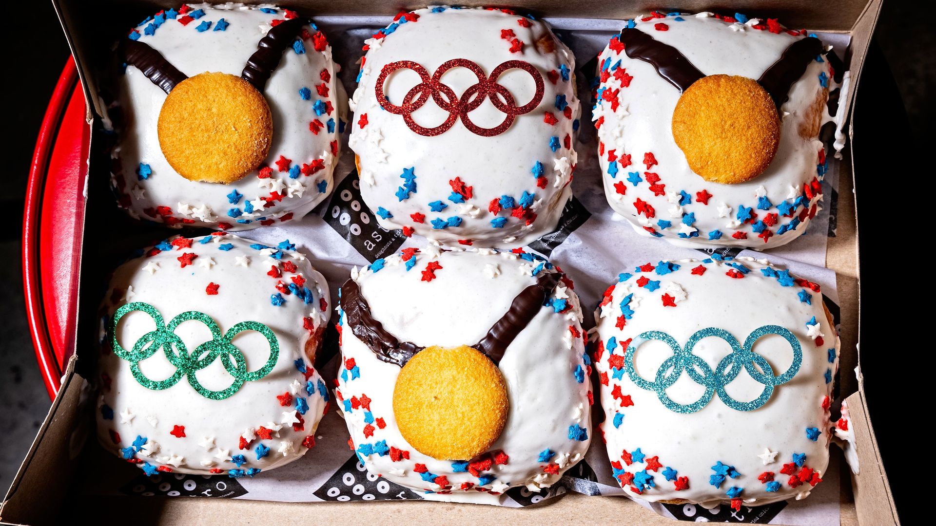 A box of themed Olympic doughnuts