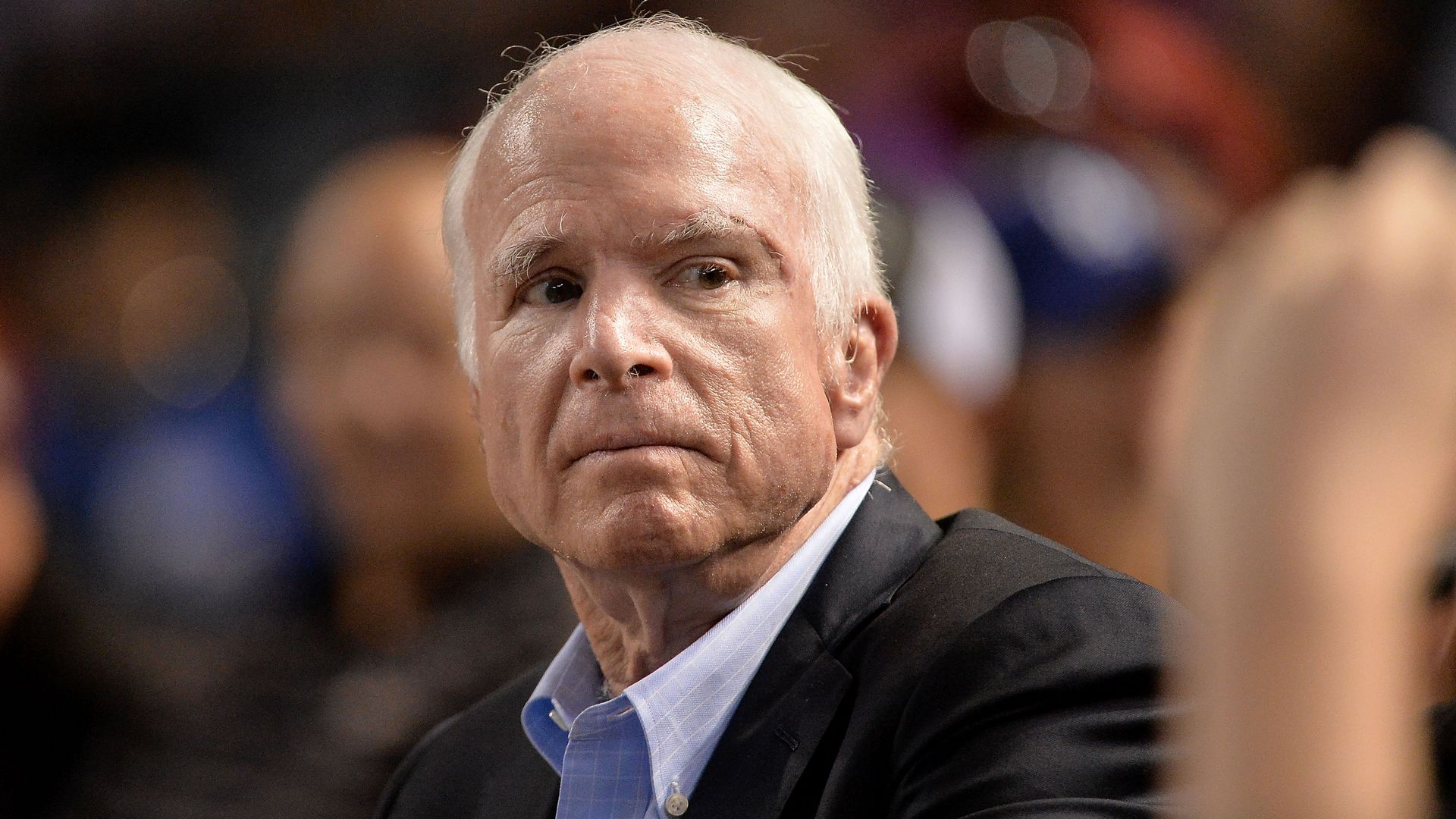 John McCain looks out at a crowd