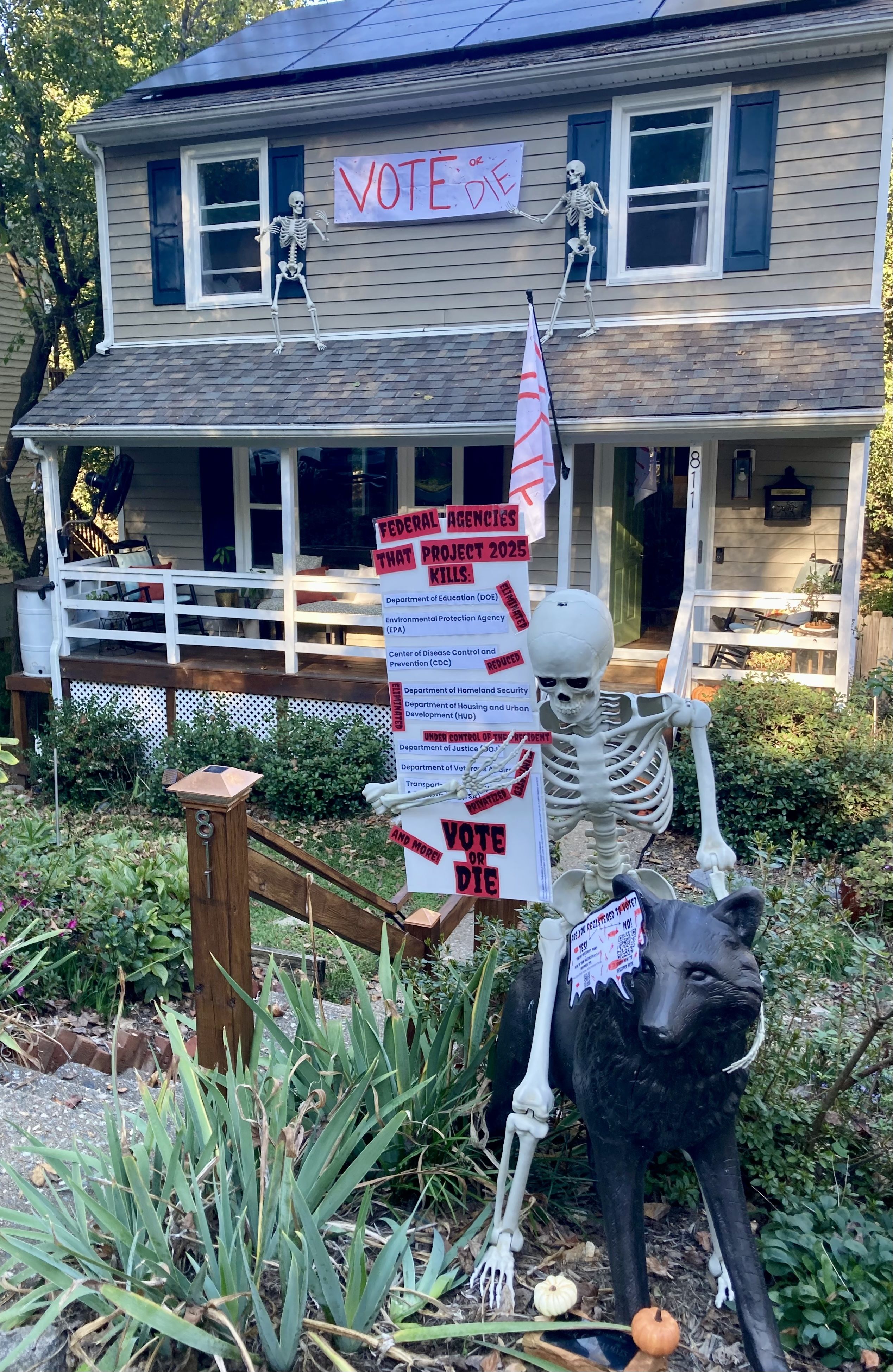 a skeleton holding the declaration of independence 