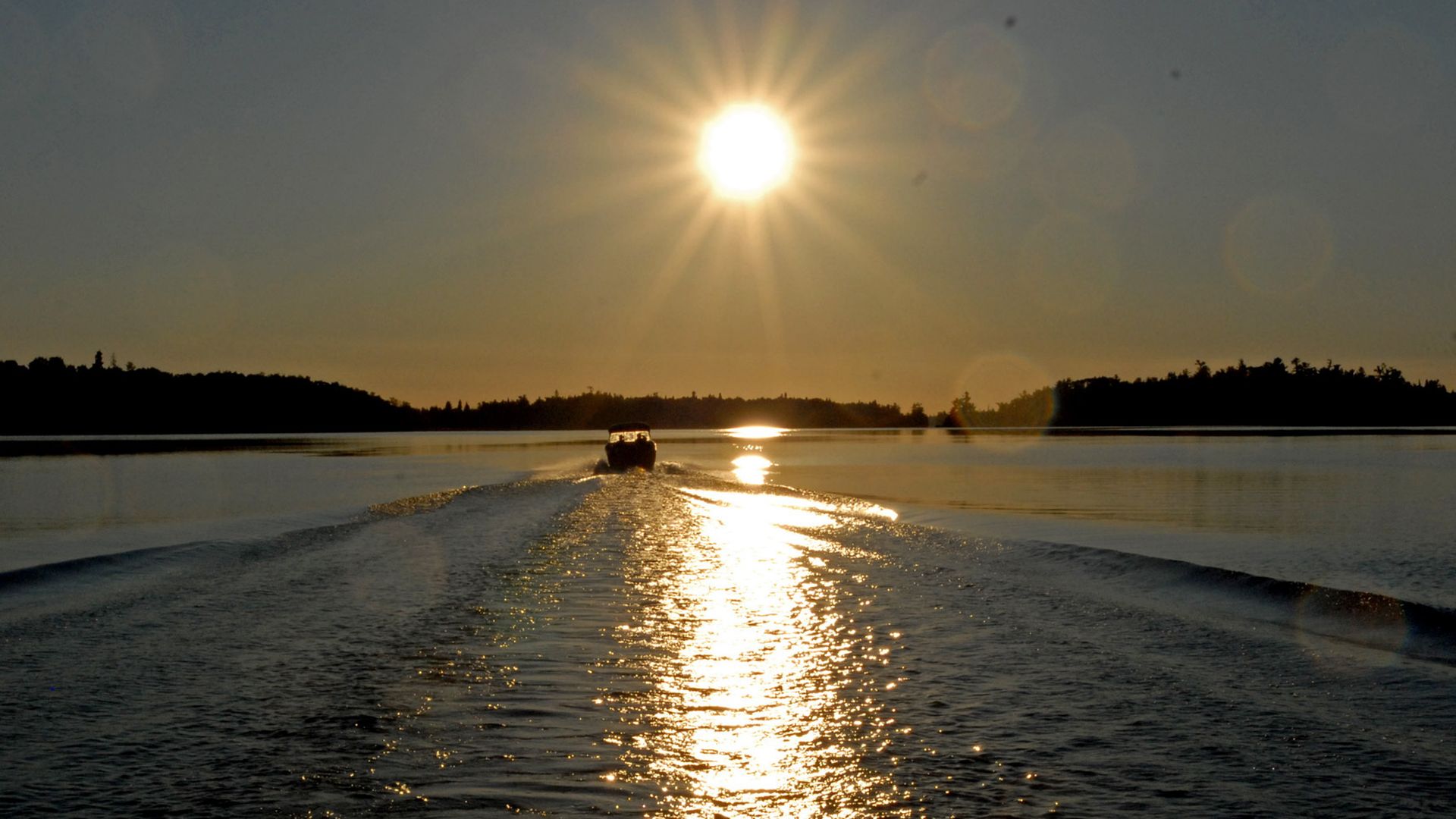 lake with a boat on it